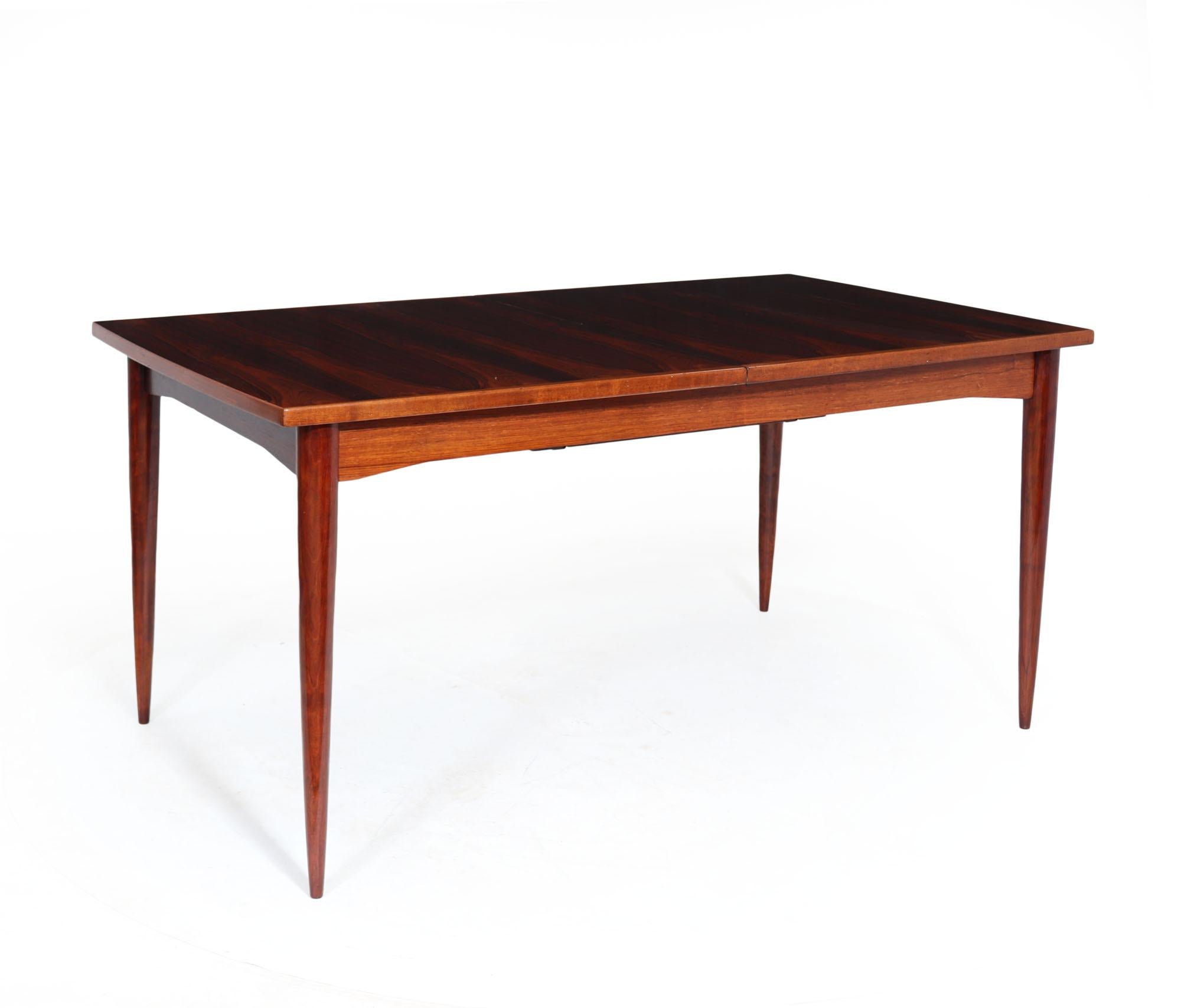 MID CENTURY EXTENDING TABLE
A French Mid-Century Modern extending dining table with hidden ‘Butterfly leaf’ the table will comfortably seat six when closed. The table has been restored where necessary and fully professionally polished by hand and