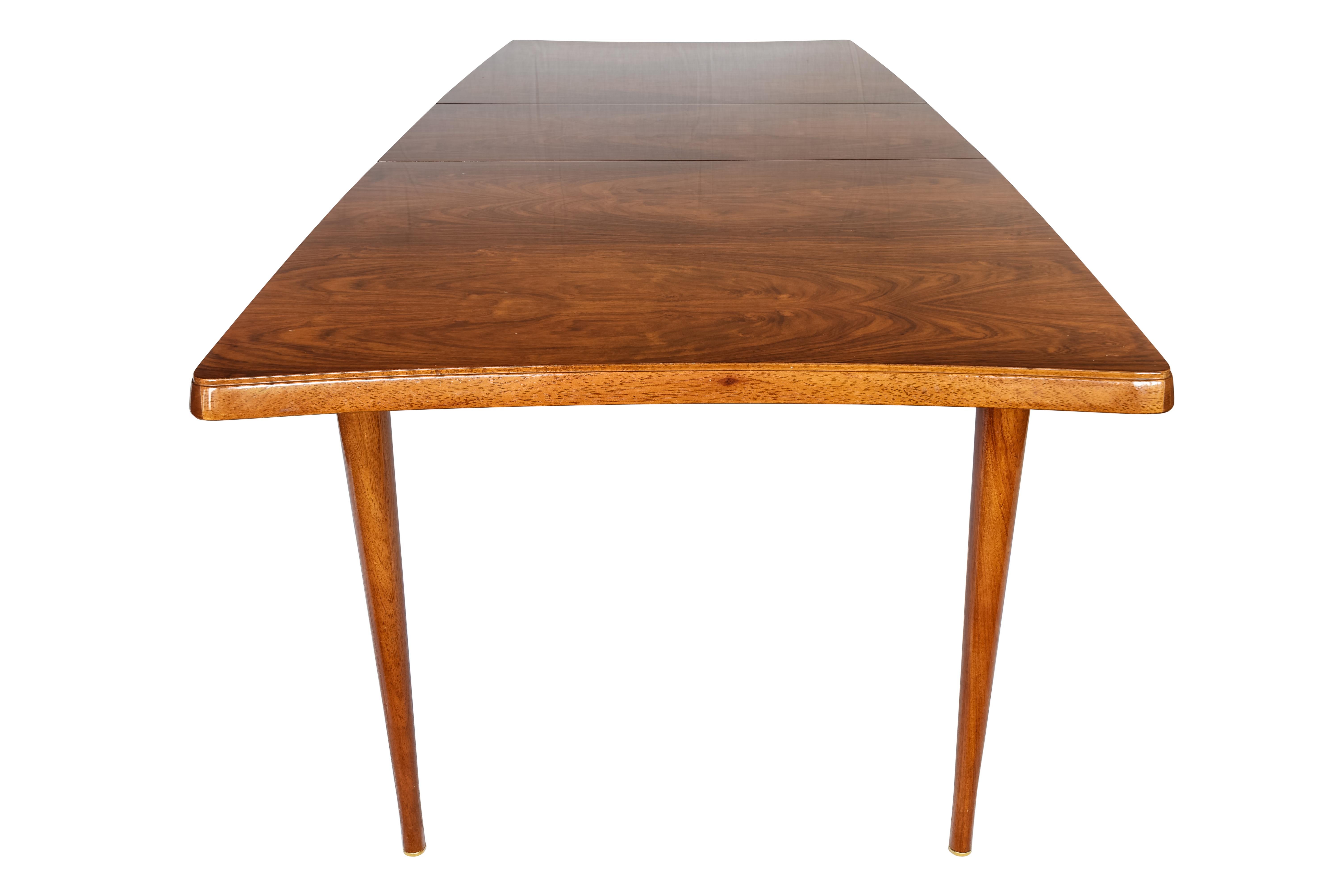 Midcentury rosewood extensible dinning table by Leslie Layton and Malcolm Lazarus for Uniflex, 1960s.
A rarely seen design by Leslie Layton and Malcolm Lazarus for Uniflex, 1960s. This elegant and wonderfully proportioned table features a richly