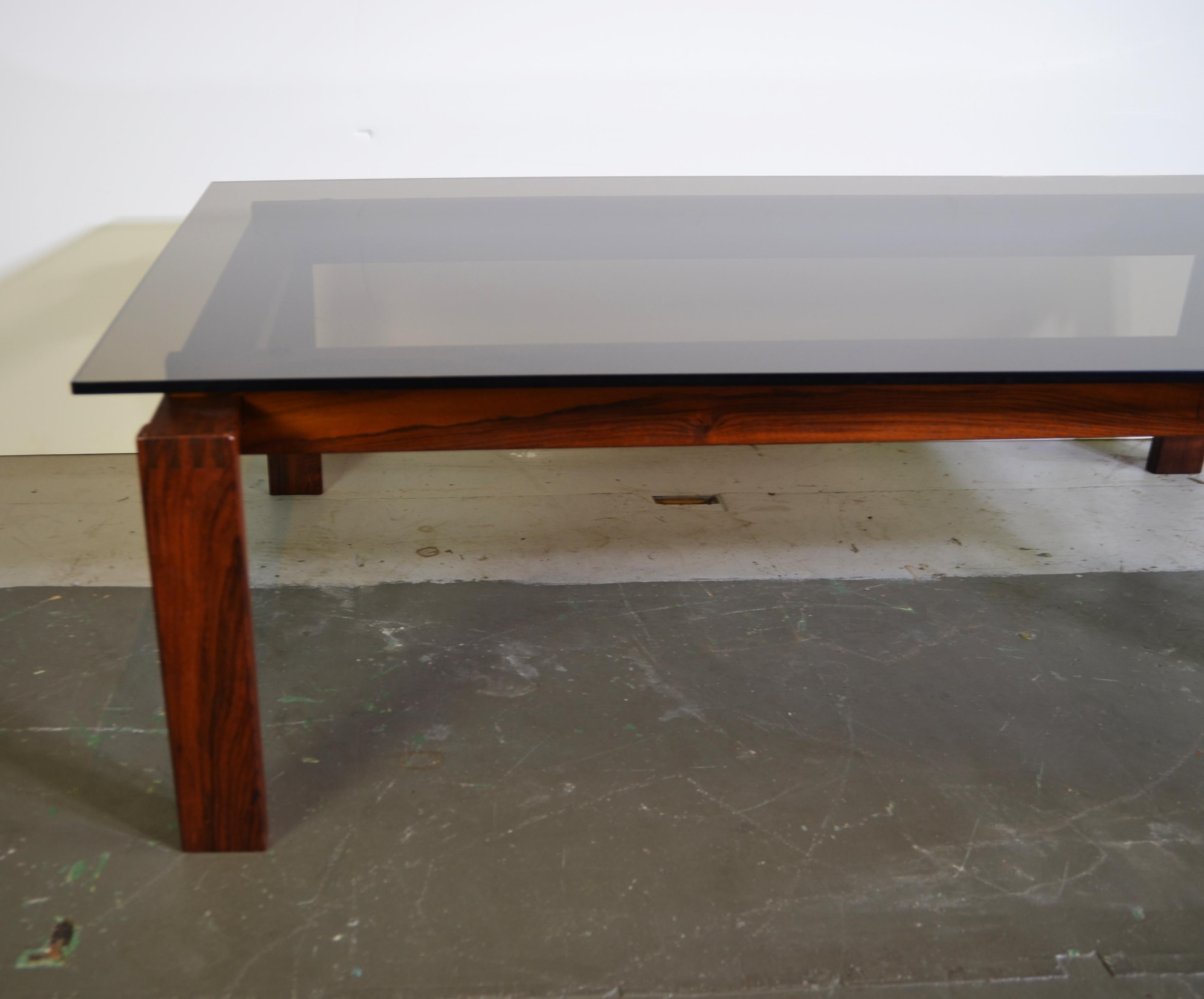 Mid-century rosewood smoke glass top coffee table.