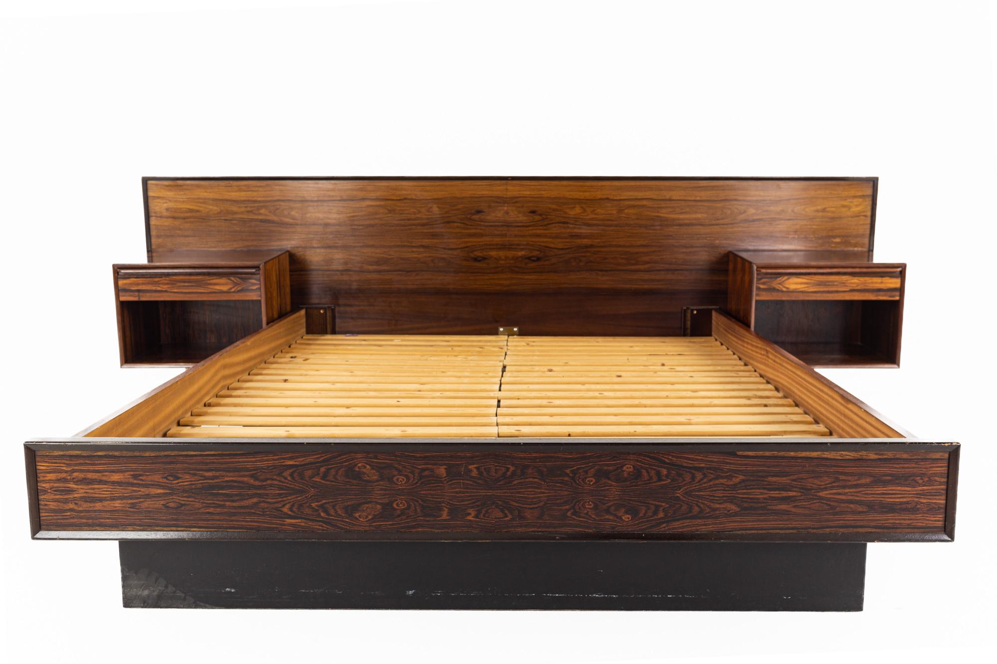 Mid Century Rosewood King Platform Bed with Floating Nightstands

The bed measures: 107 wide x 83 deep x 32 inches high

All pieces of furniture can be had in what we call restored vintage condition. That means the piece is restored upon