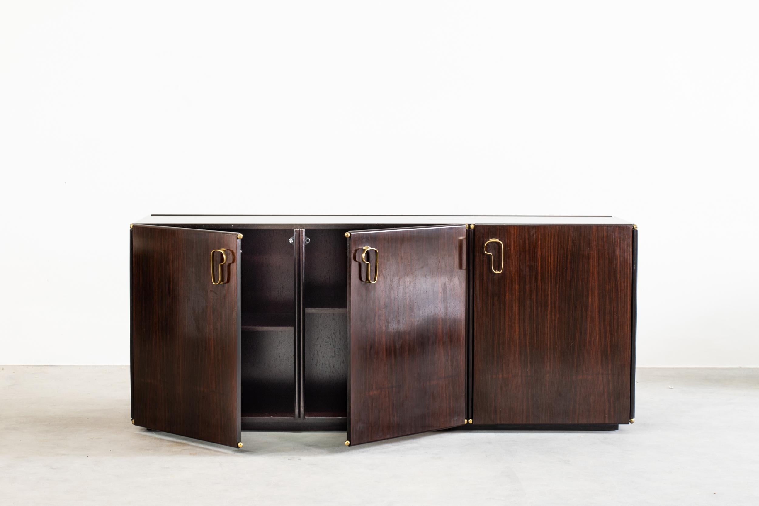 Rosewood Sideboard with Handcrafted Handles
Italian Manufacture, 1950s
Width 180 x Depth 50 x Height 75 cm.