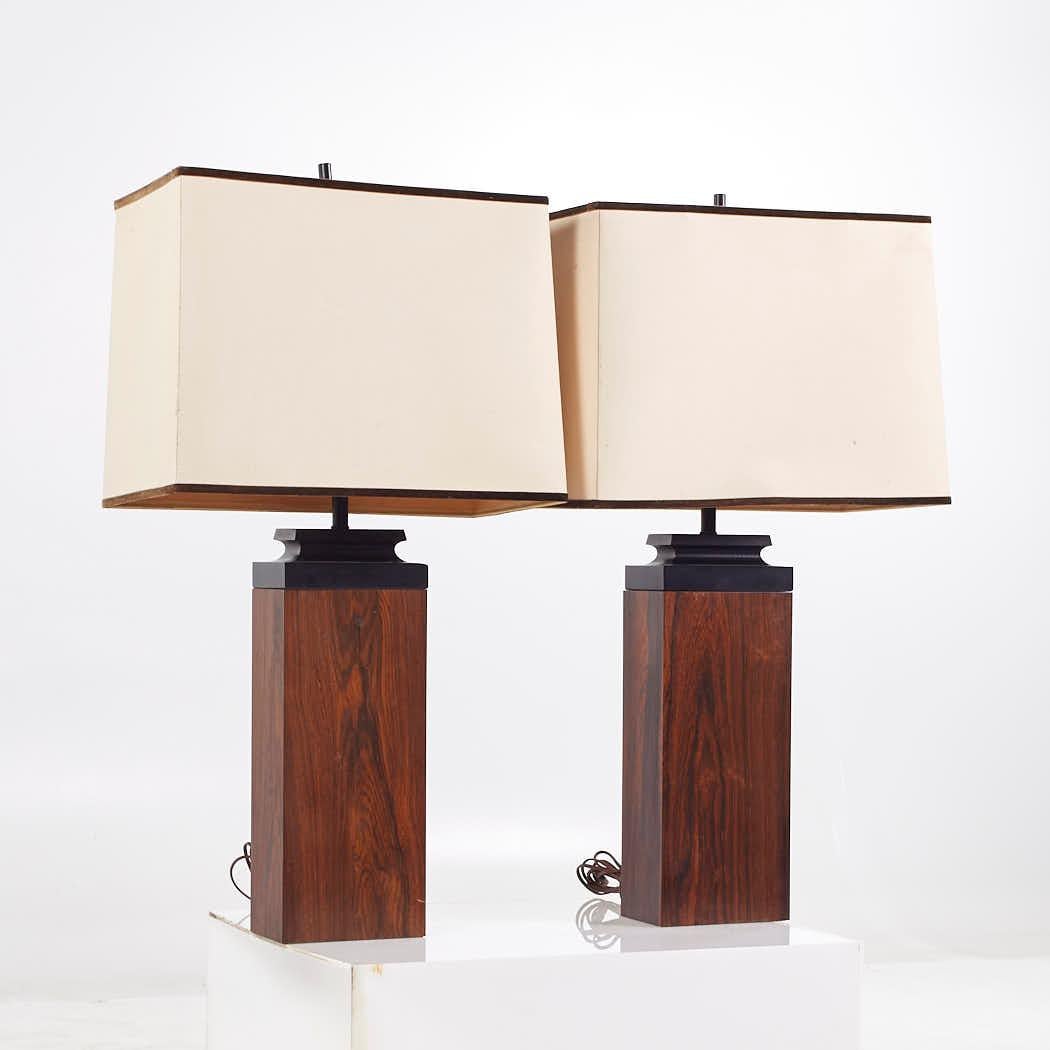 Mid Century Rosewood Table Lamps

Each lamp measures: 19 wide x 10 deep x 35.5 inches high

All pieces of furniture can be had in what we call restored vintage condition. That means the piece is restored upon purchase so it’s free of watermarks,