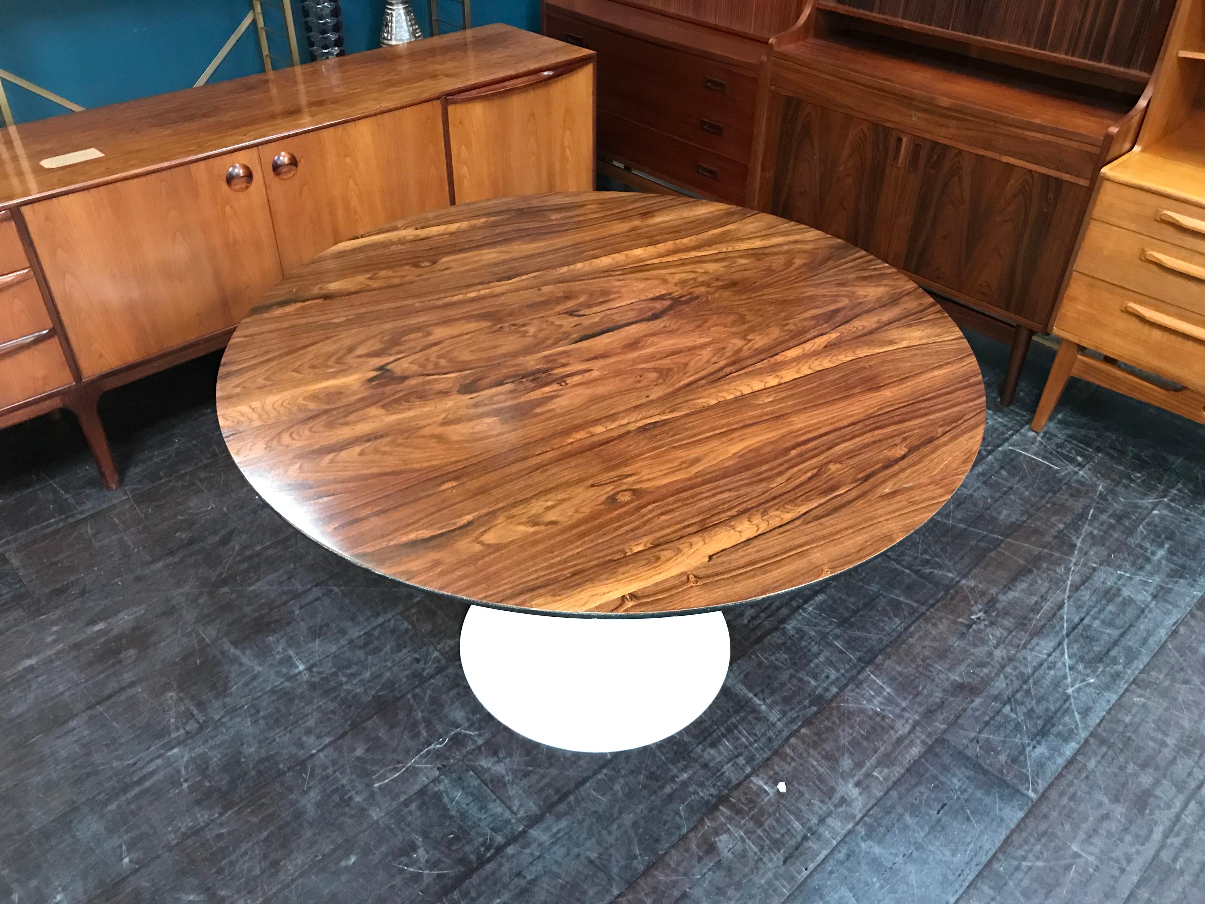 This is a super cool midcentury rosewood tulip table designed by Maurice Burke for Arkana in the 1960s. The grain on the table is absolutely stunning and the white ‘tulip’ base has been re-lacquered.

Arkana furniture seems to have been made