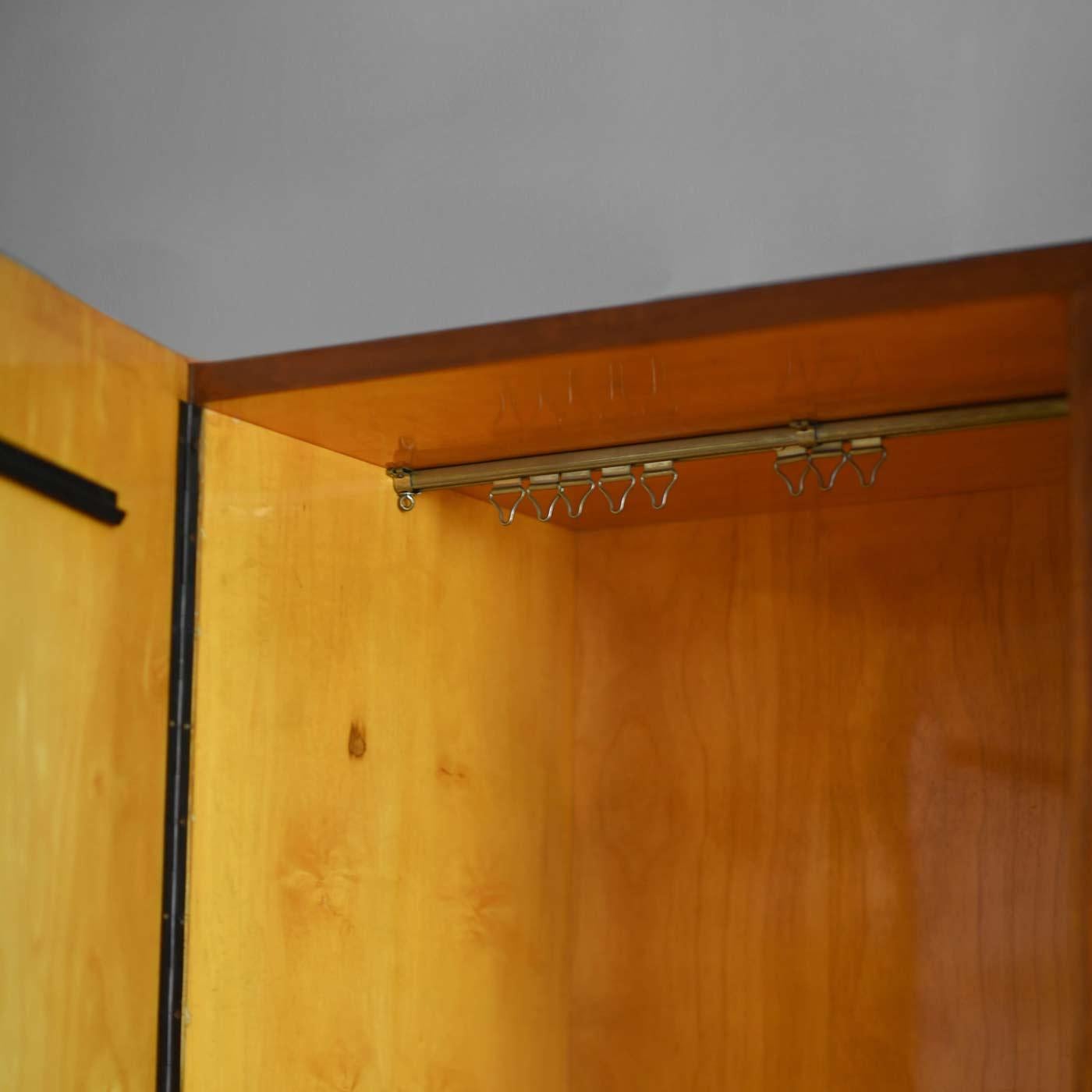 Mid-century wardrobes with doors and shelves from the 1960s. Two units available.