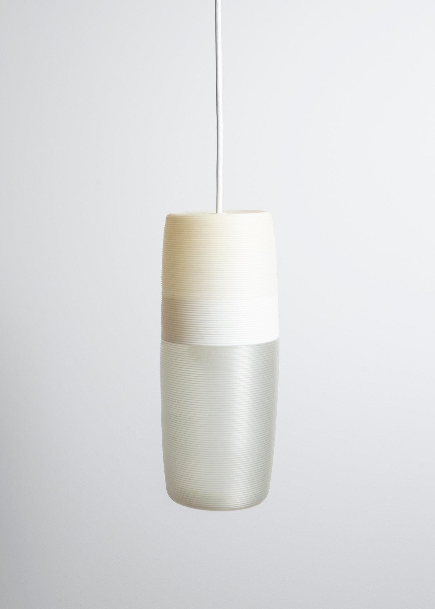 Rotaflex pendant lamp designed by John and Sylvia Reid and manufactured by Rotaflex in the 1950’. Tubular ribbed cellulose acetate shade. 60 watts E-26 medium based incandescent bulb recommended or higher if LED/CFL.
Rewired with E-26 Edison medium