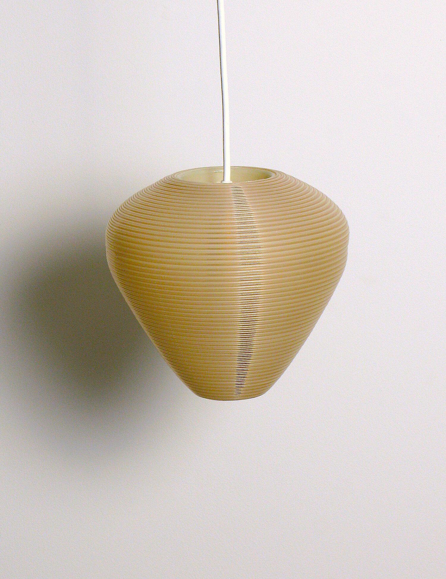 Rotaflex pendant lamp designed by John and Sylvia Reid and manufactured by Rotaflex in the 1950’s. Ribbed cellulose acetate shade. 60 watts E-26 medium based incandescent bulb recommended or higher if LED/CFL.
Rewired with E-26 Edison medium base