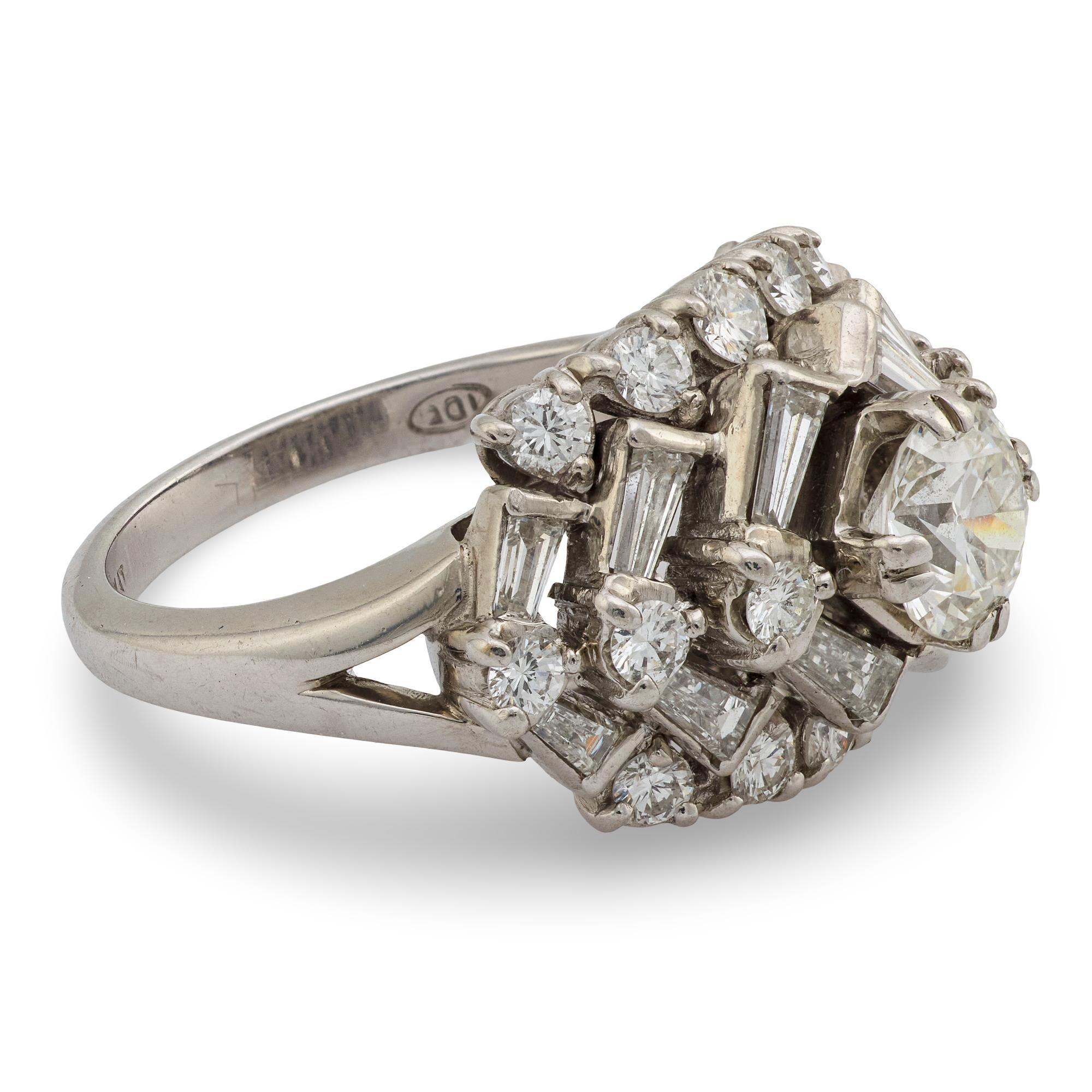 Women's Mid Century round and baguette diamond platinum cocktail ring For Sale
