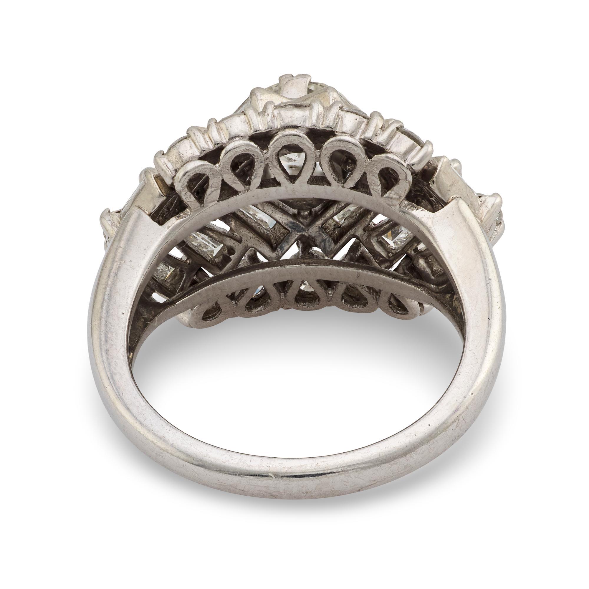 Mid Century round and baguette diamond platinum cocktail ring For Sale 2