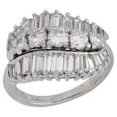 Mid Century round brilliant and baguette cut diamond platinum ring