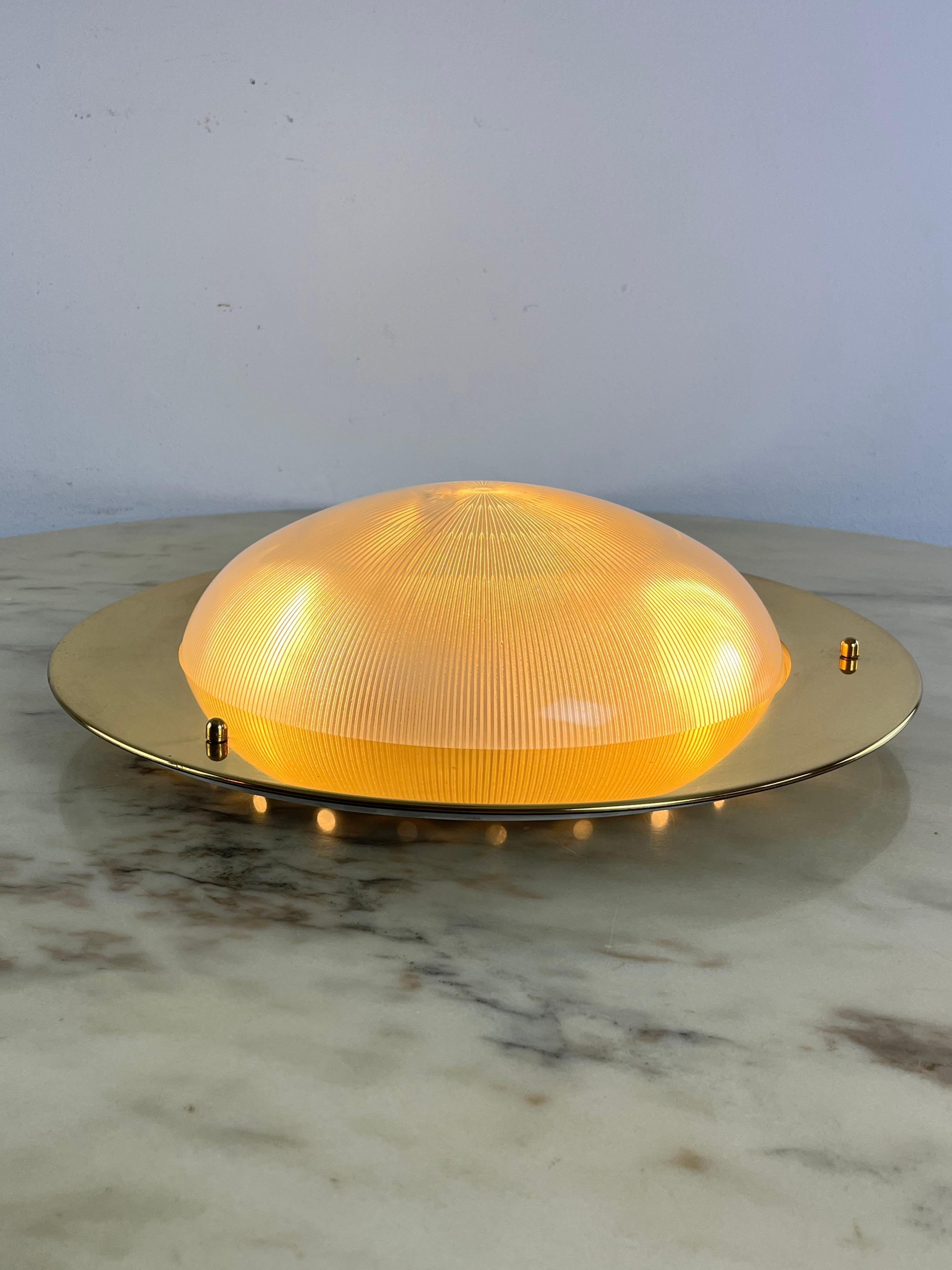 Mid-Century round ceiling light in the style of Luigi Caccia Dominioni 1960s
Three E27 lamps. Complete and in good condition.