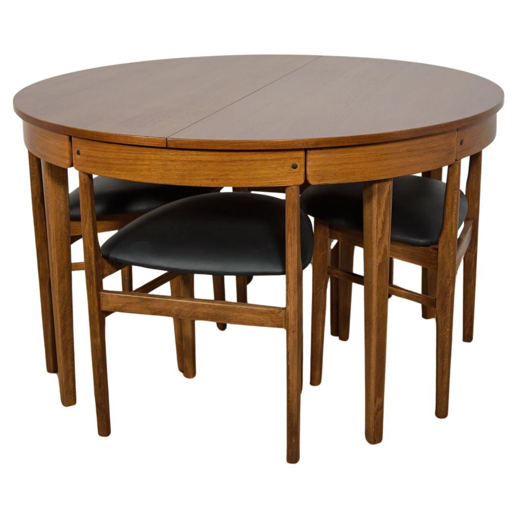 Mid-Century Round Extendable Dining Table and Chairs from McIntosh, 1960s. For Sale
