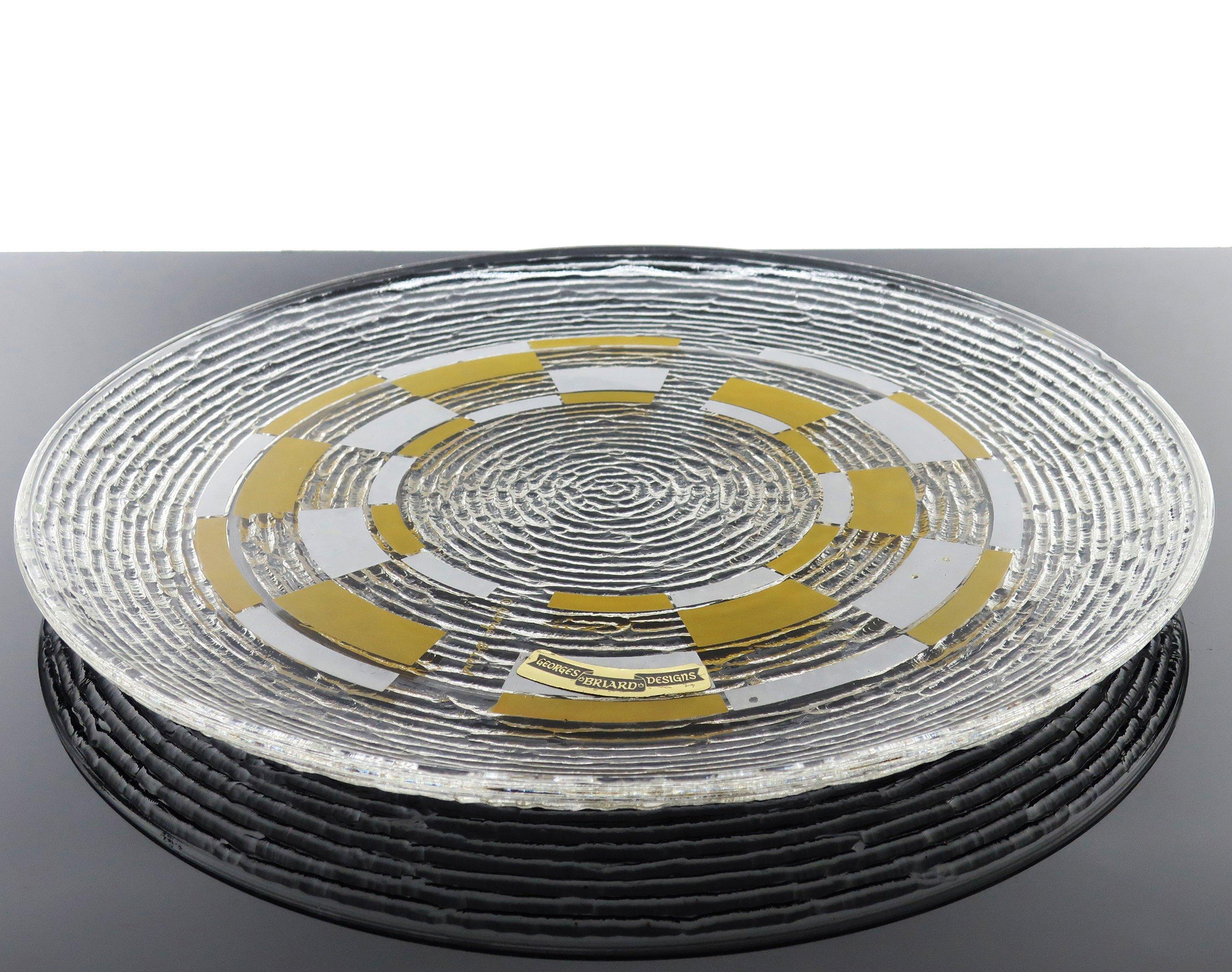 Georges Briard, born Jascha Brojdo in Ukraine in 1917, was a prodigious designer from the 1950s-80s known for his signature dish and glassware. This round glass serving tray has a Brutalist feel to the textured underside and white and yellow shapes