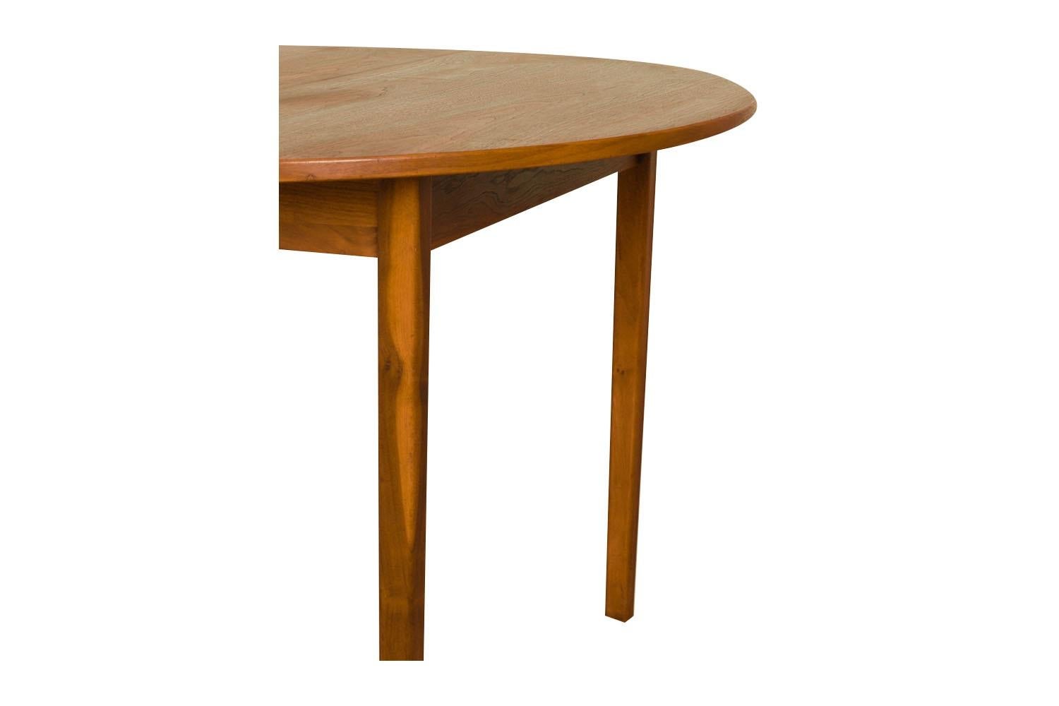 Mid-Century Round Oval Extendable Dining Table For Sale 1
