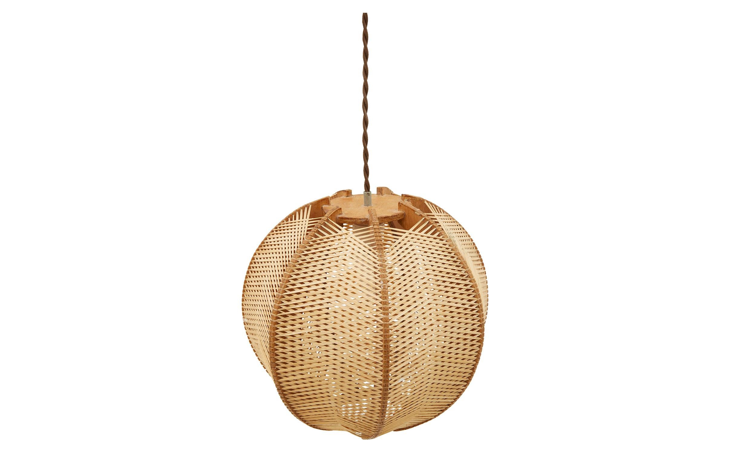 • Wood frame wrapped in thin pieces of reed
• Rewired with brown twisted rayon
• Brass canopy
• Mid-20th century
• Spain

Dimensions
• 11