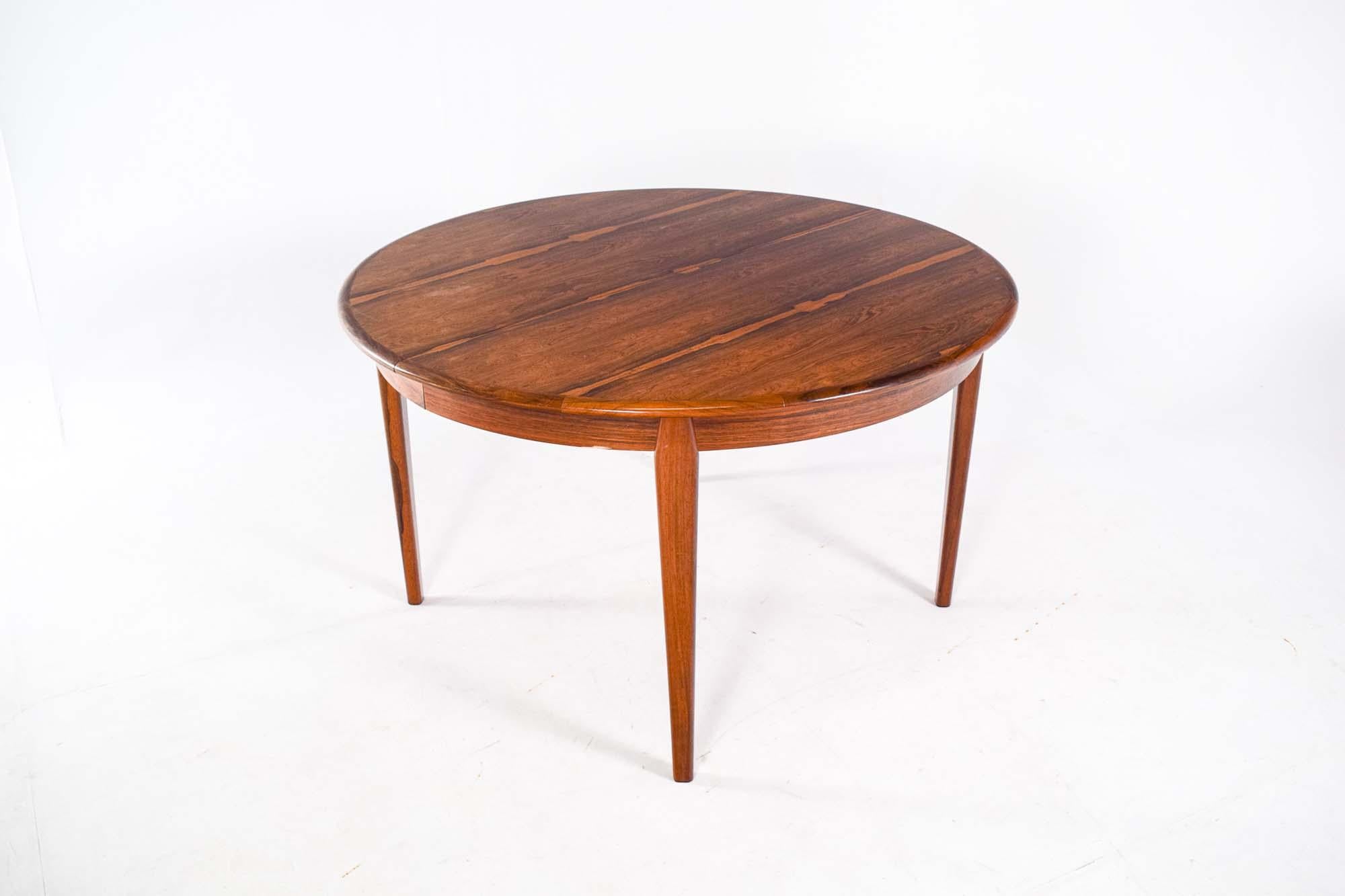 Mid-Century Modern Mid Century Round Rosewood Extendable Dining Table by H. Sighs & Sons