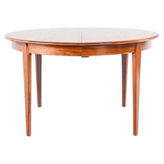 Table de salle à manger ronde à rallonge du milieu du siècle dernier en bois de rose de H. Sighs & Sons