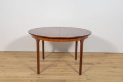 Mid Century Round Rosewood  Extendable Dining Table from McIntosh.