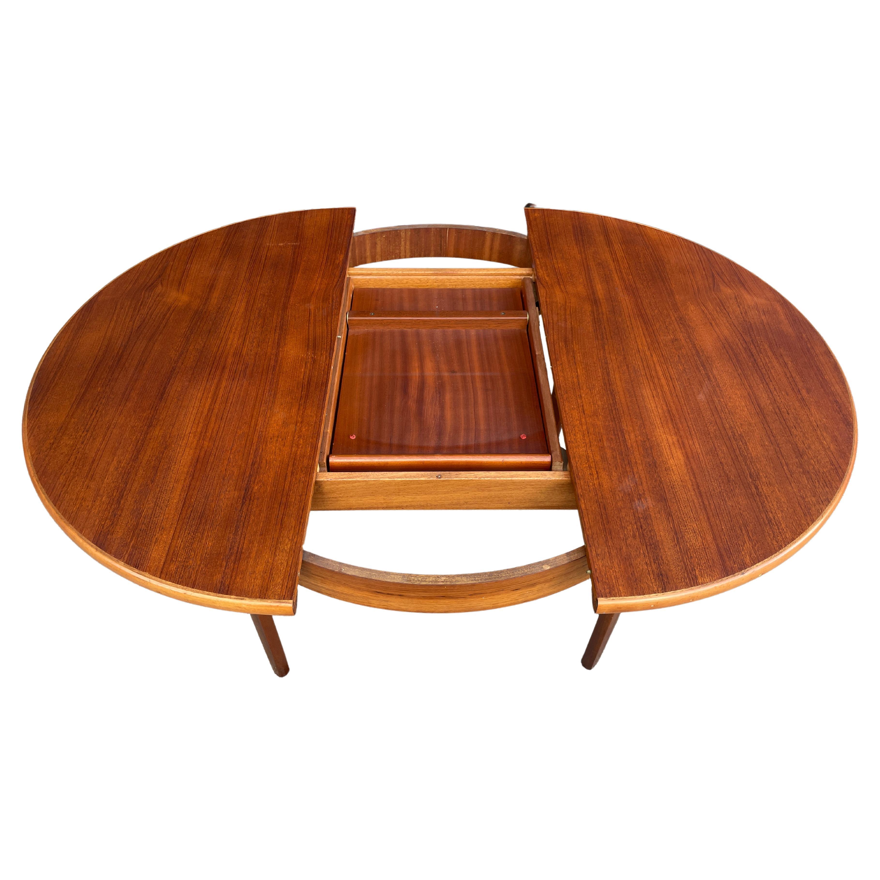 mid century round teak dining table
