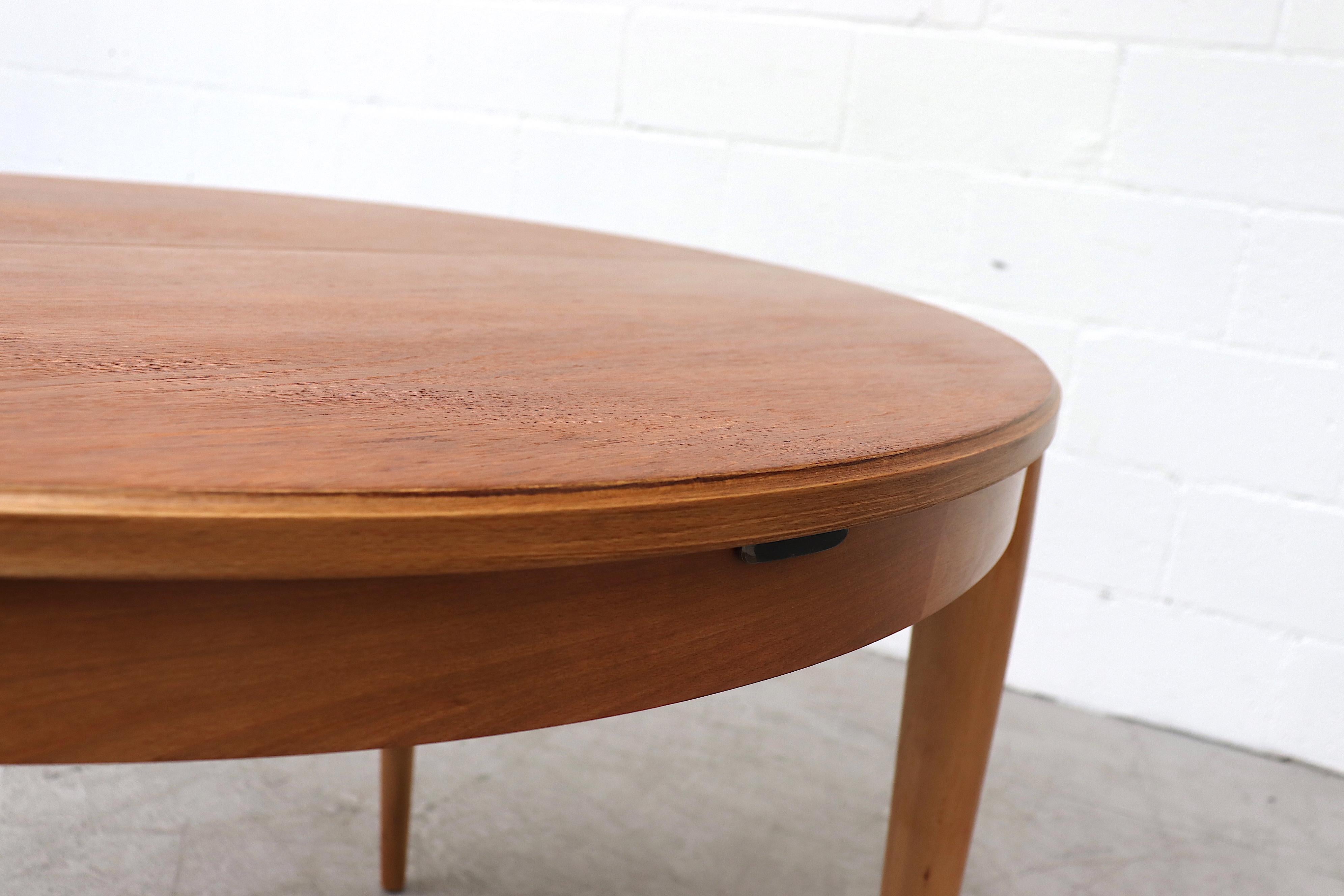 Midcentury Round Teak Dining Table with Hidden Leaf 3