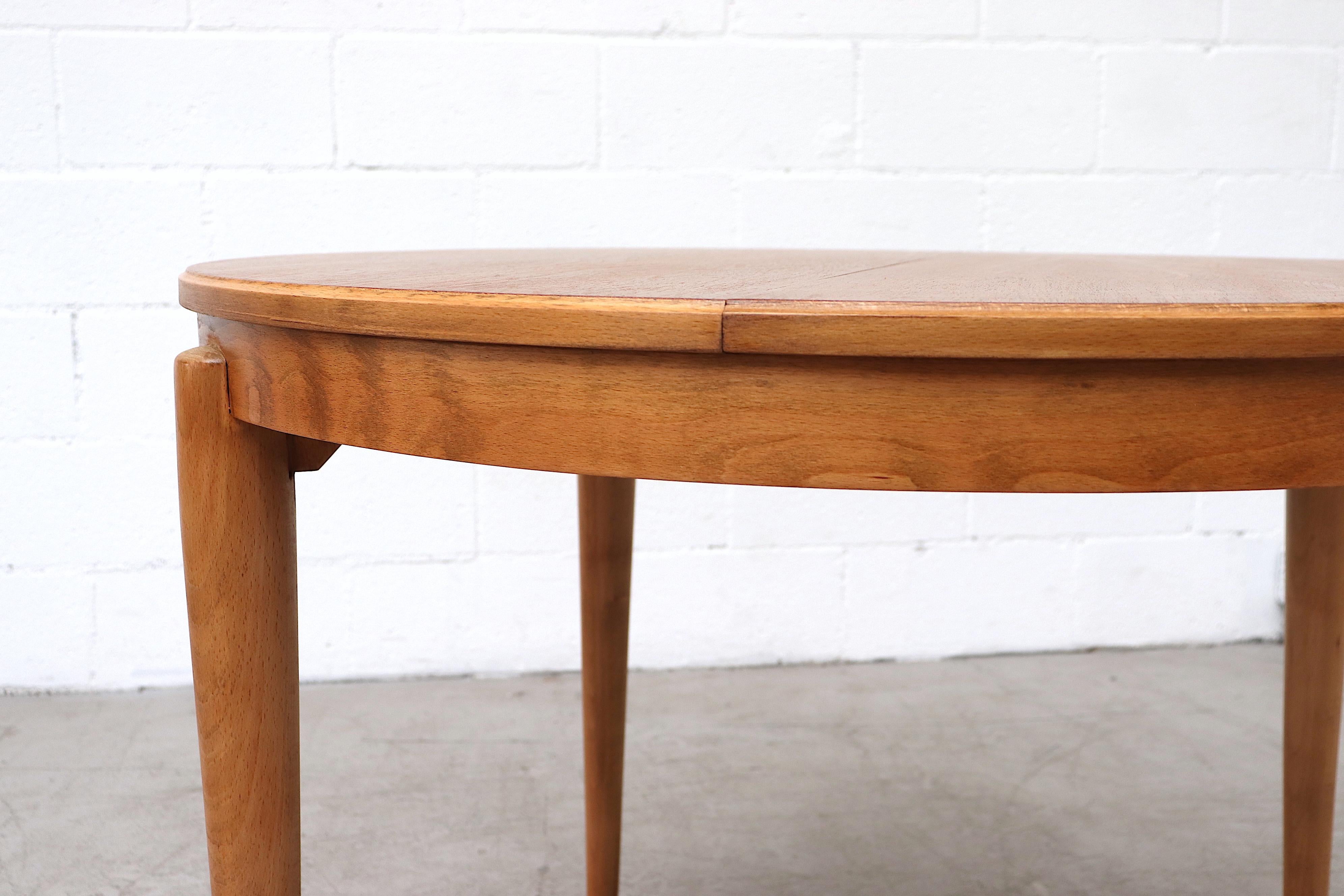 Midcentury Round Teak Dining Table with Hidden Leaf 4