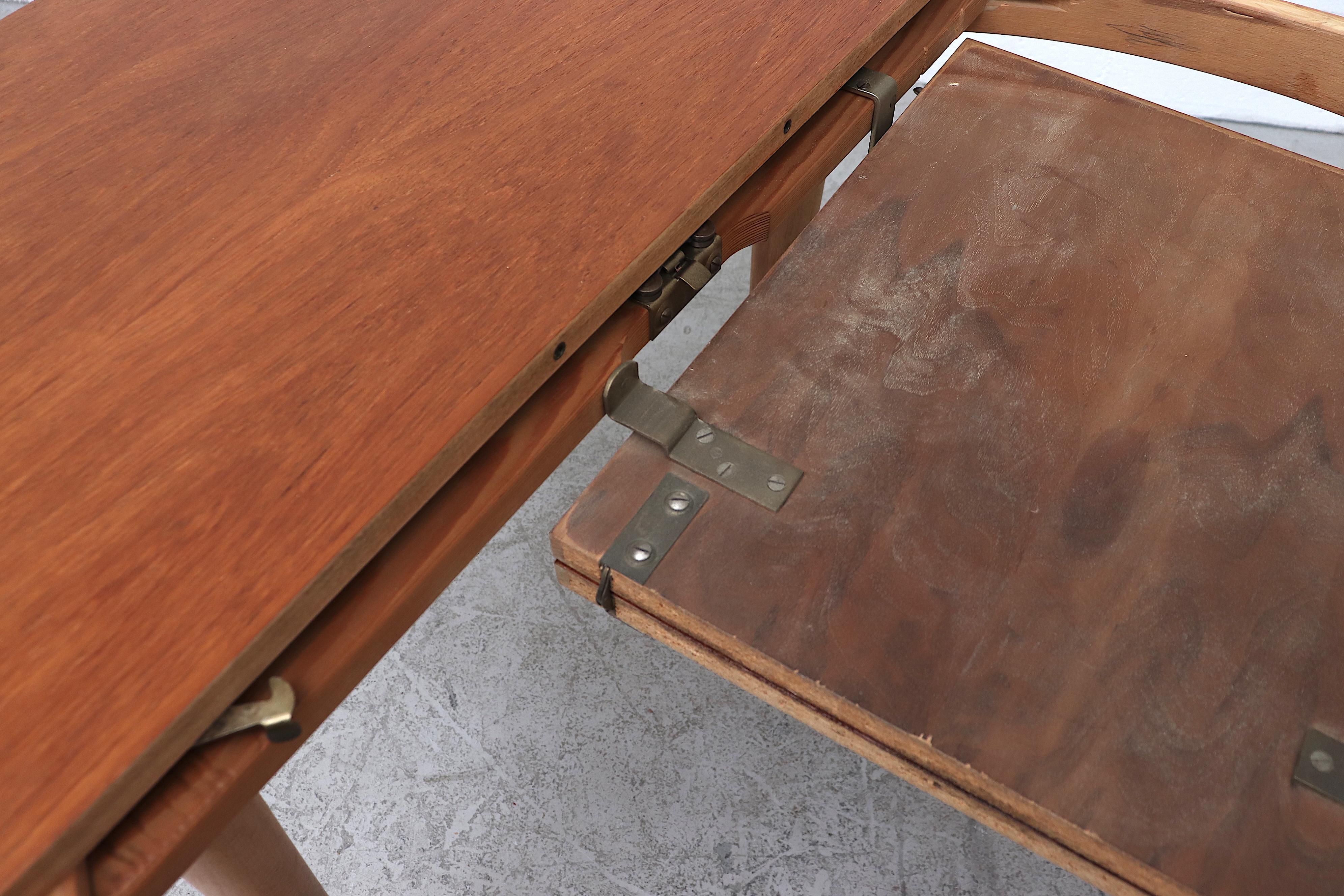 Midcentury Round Teak Dining Table with Hidden Leaf 1
