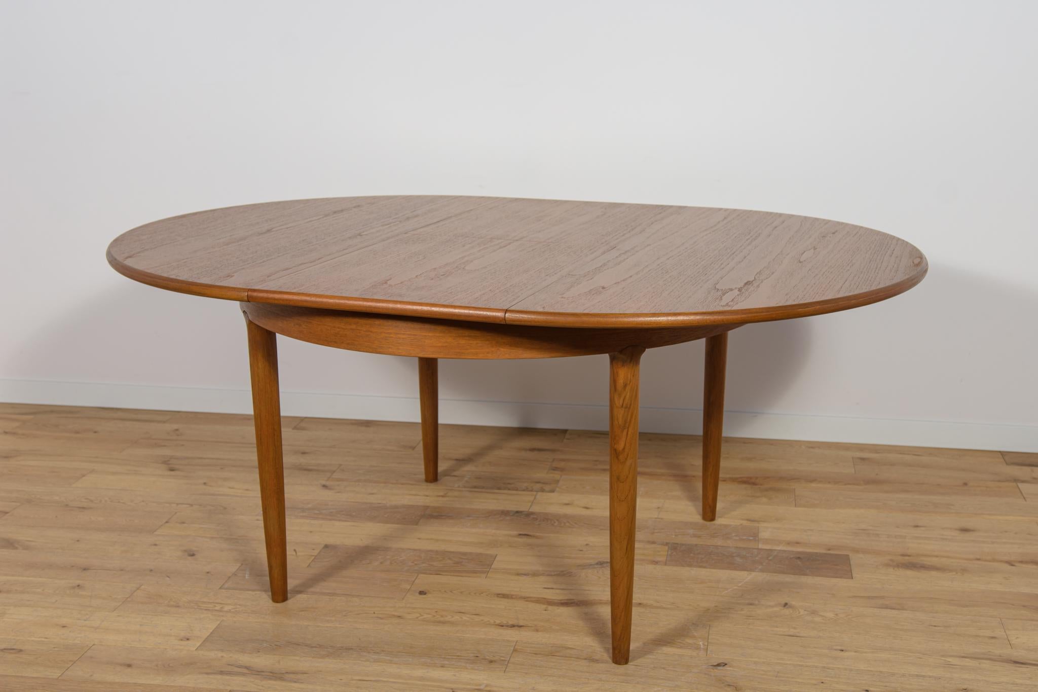 Mesa de comedor redonda extensible de teca de mediados de siglo, United Knigdom, años 60 en venta 3
