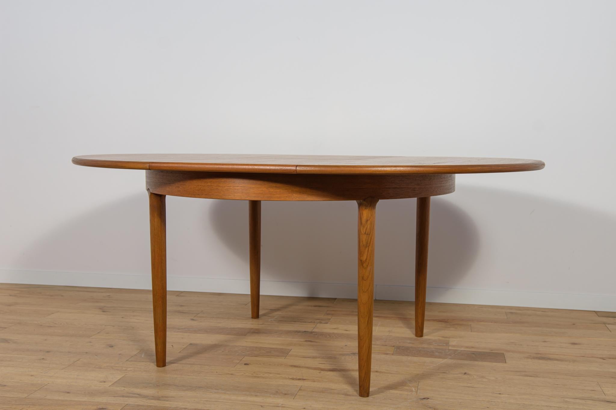 Mesa de comedor redonda extensible de teca de mediados de siglo, United Knigdom, años 60 en venta 4