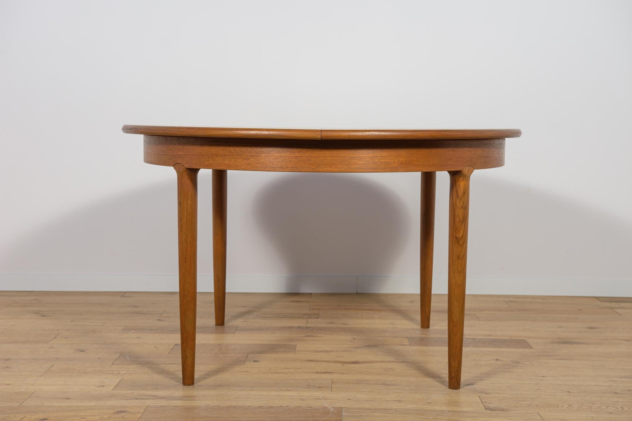 Mesa de comedor redonda extensible de teca de mediados de siglo, United Knigdom, años 60 Moderno de mediados de siglo en venta
