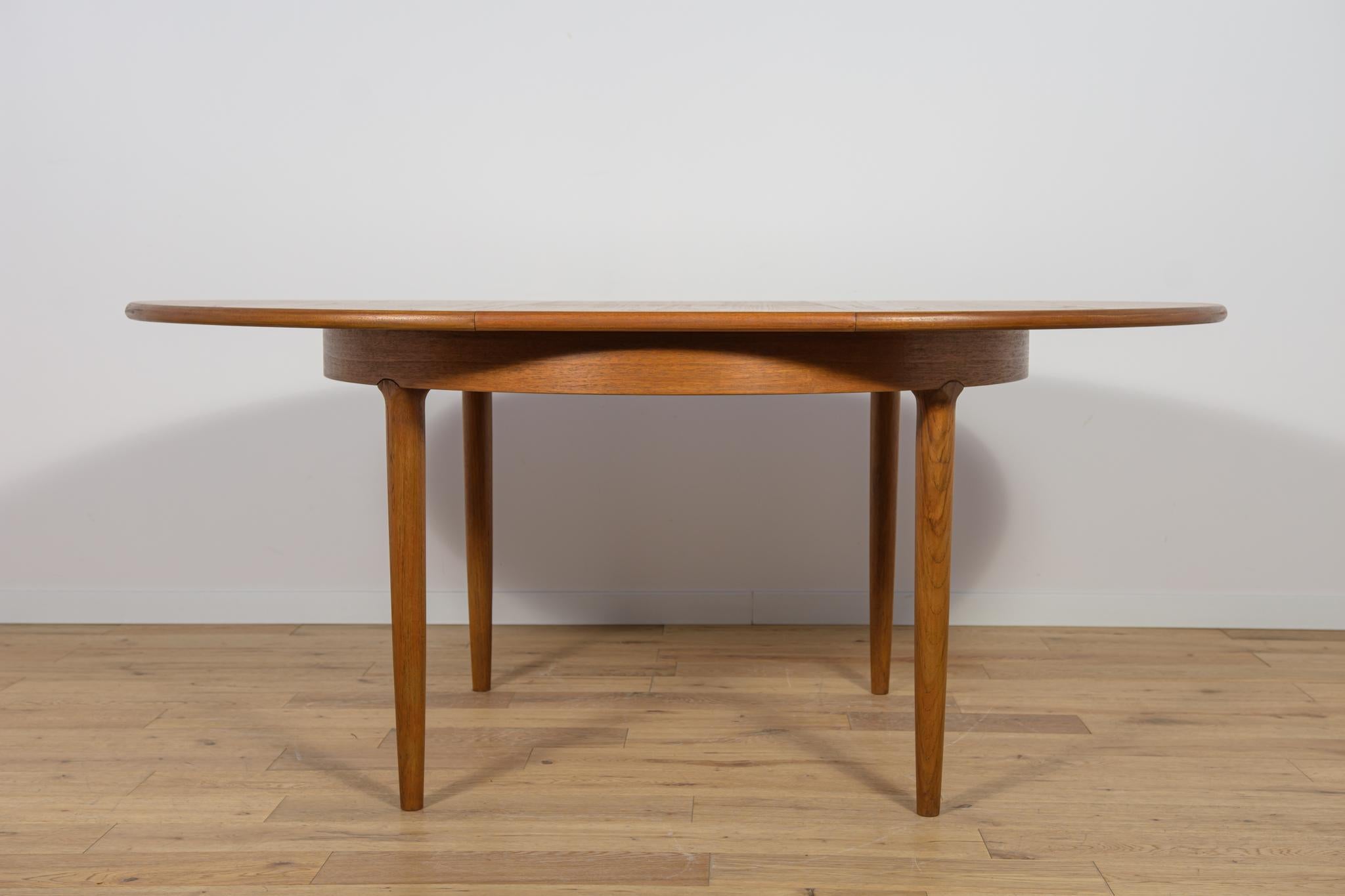 Mesa de comedor redonda extensible de teca de mediados de siglo, United Knigdom, años 60 en venta 1