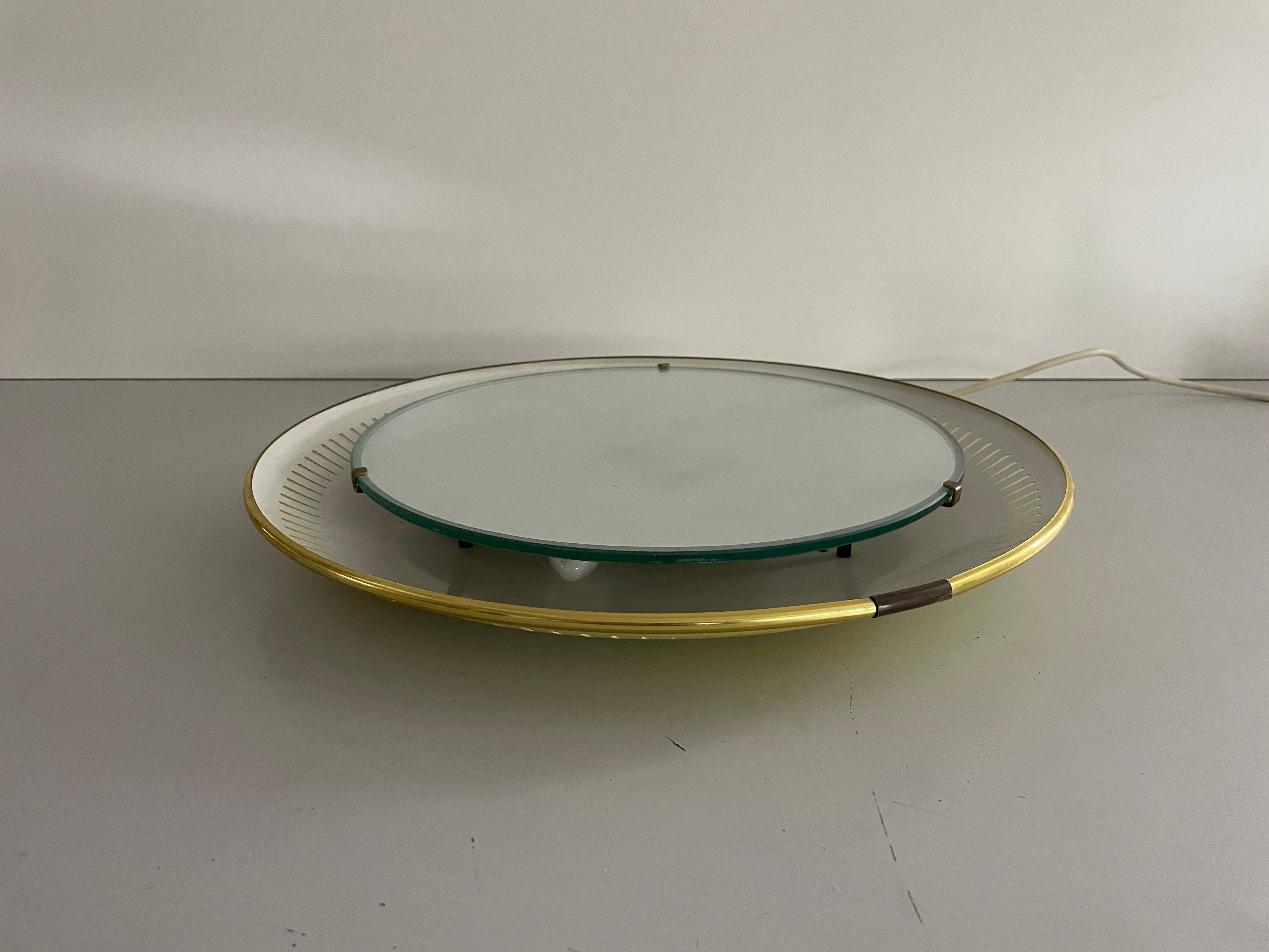 Espejo de pared redondo con luz de mediados de siglo, Hillebrand, Años 50, Alemania Italiano en venta