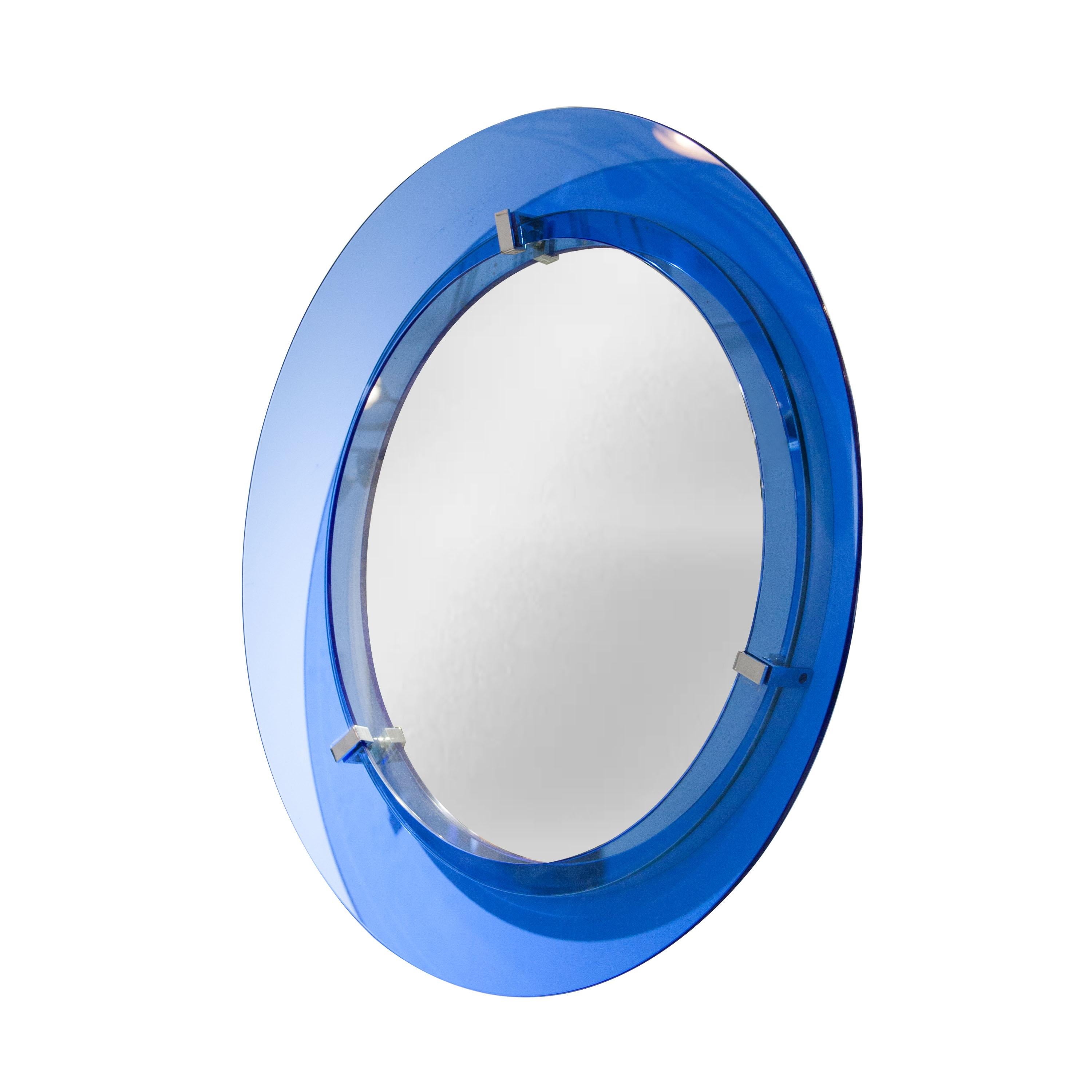 Italian rounded blue glass framed mirror. With chromed steel details and original mirror glass with time marks.
 