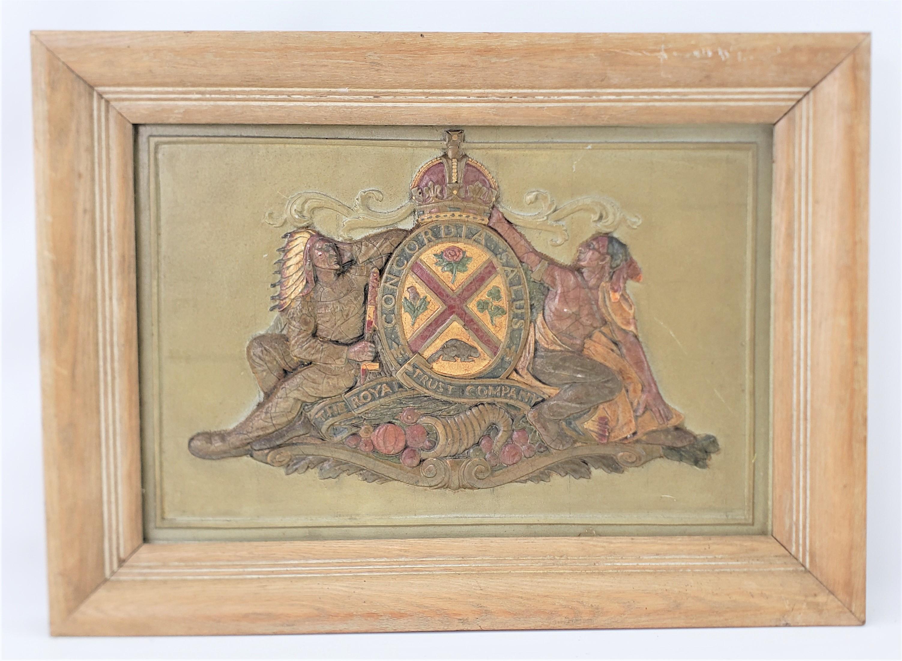This wall plaque is unsigned with respect to the maker, but it is presumed to have been made in Canada in approximately 1950 in a traditional style. The plaque is composed of a very detailed casting with white metal or spelter that has been