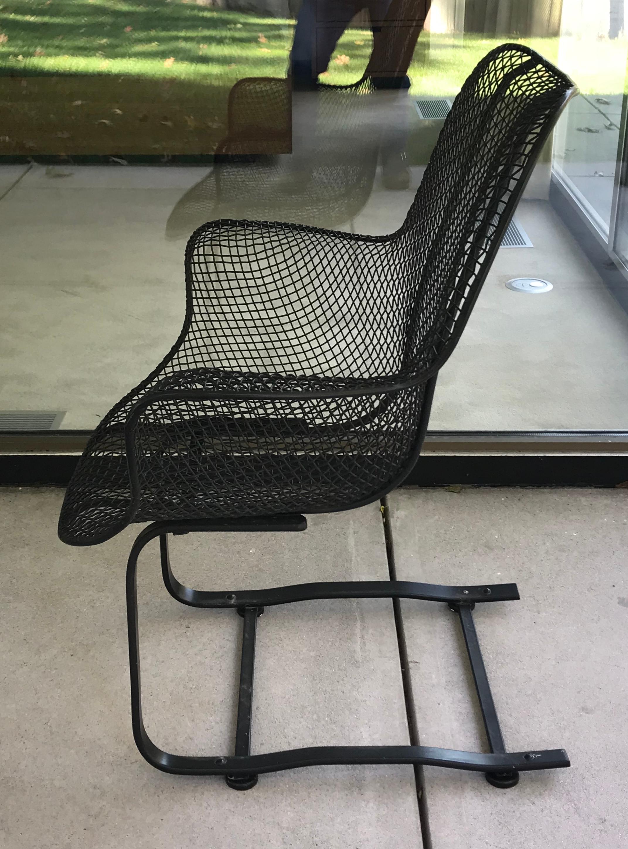 Very cool mid century Russell Woodard Sculptura series wrought iron wire mesh lounge rocking chair, 1950s.