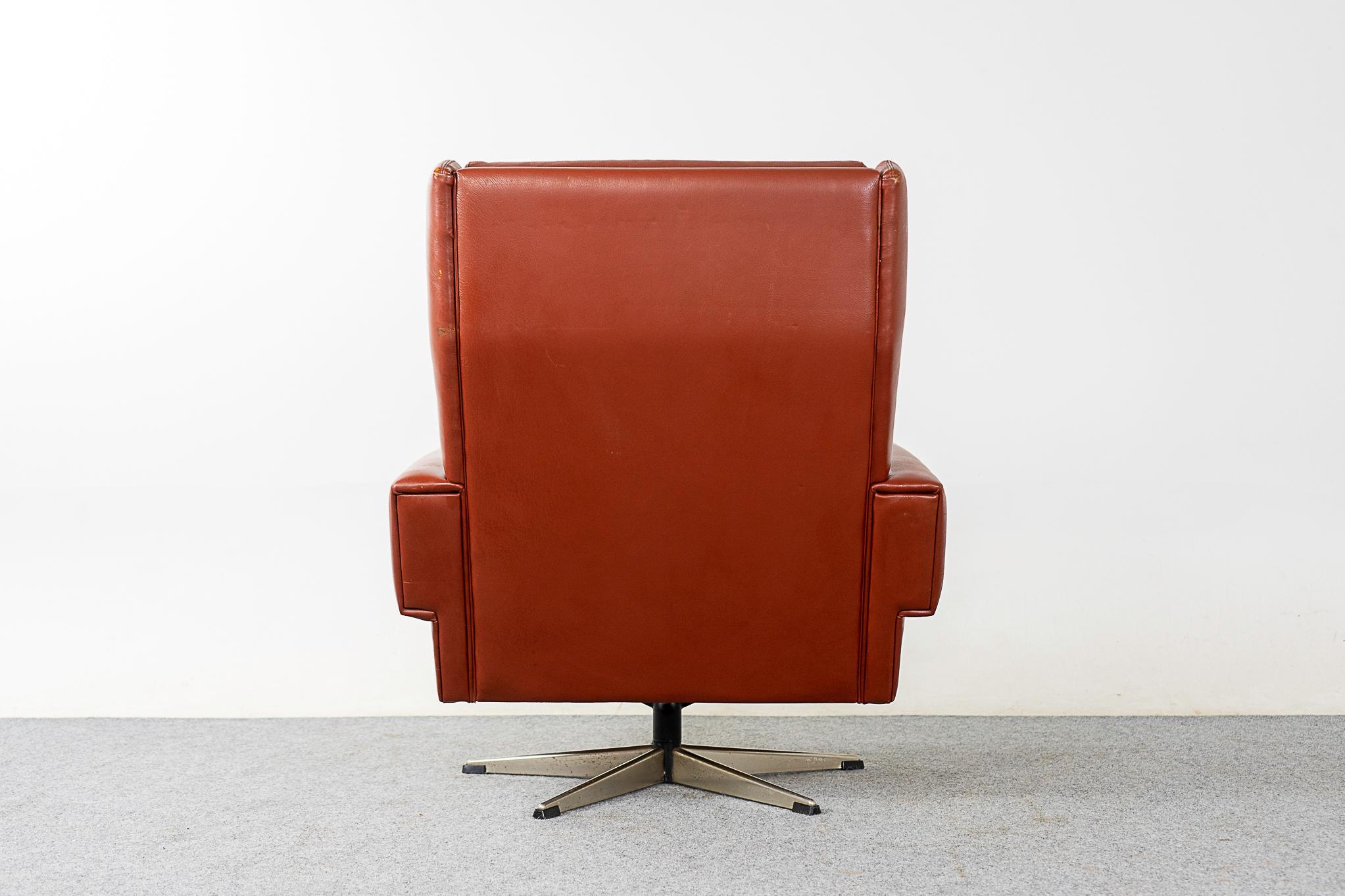 Metal Mid-Century Rust Leather Swivel Chair For Sale