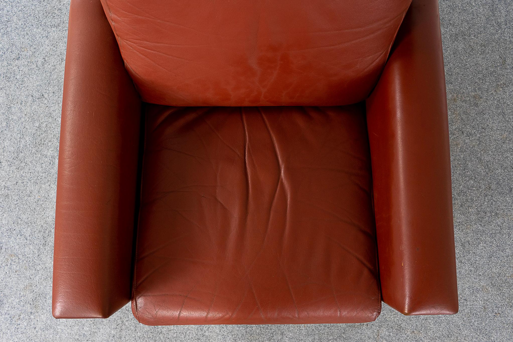orange leather swivel chair