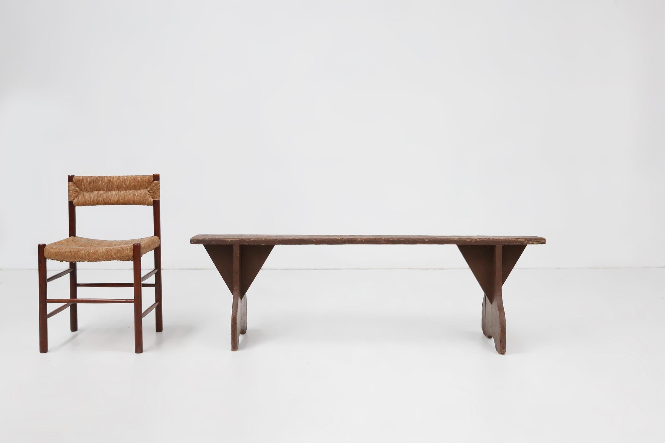 France / 1890 / bench / wood / rustic / mid-century / French provicial 

A rustic wooden bench with brown paint and beautiful patina due to age. Made in France around 1890. We can offer 2 benches of the same model.

This beautifully crafted bench is