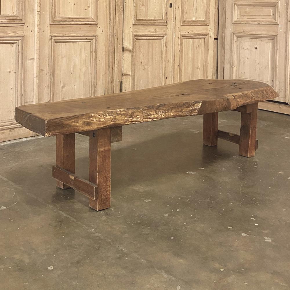 Midcentury rustic log plank coffee table is the ideal choice for the mountain cabin, lake house, or Southwest decor! Crafted from a thick plank of hardwood, it has been finished in a durable semi-gloss, and affixed to sturdy legs below for