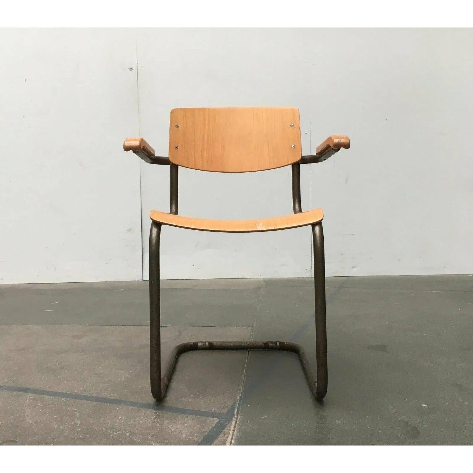 Tubular steel cantilever chair with armrests from Thonet based on a design by Mart Stam from the 1920s. These are two rare examples in a particularly rudimentary design.

The S43 is a classic among tubular steel furniture. Simple and timeless. In