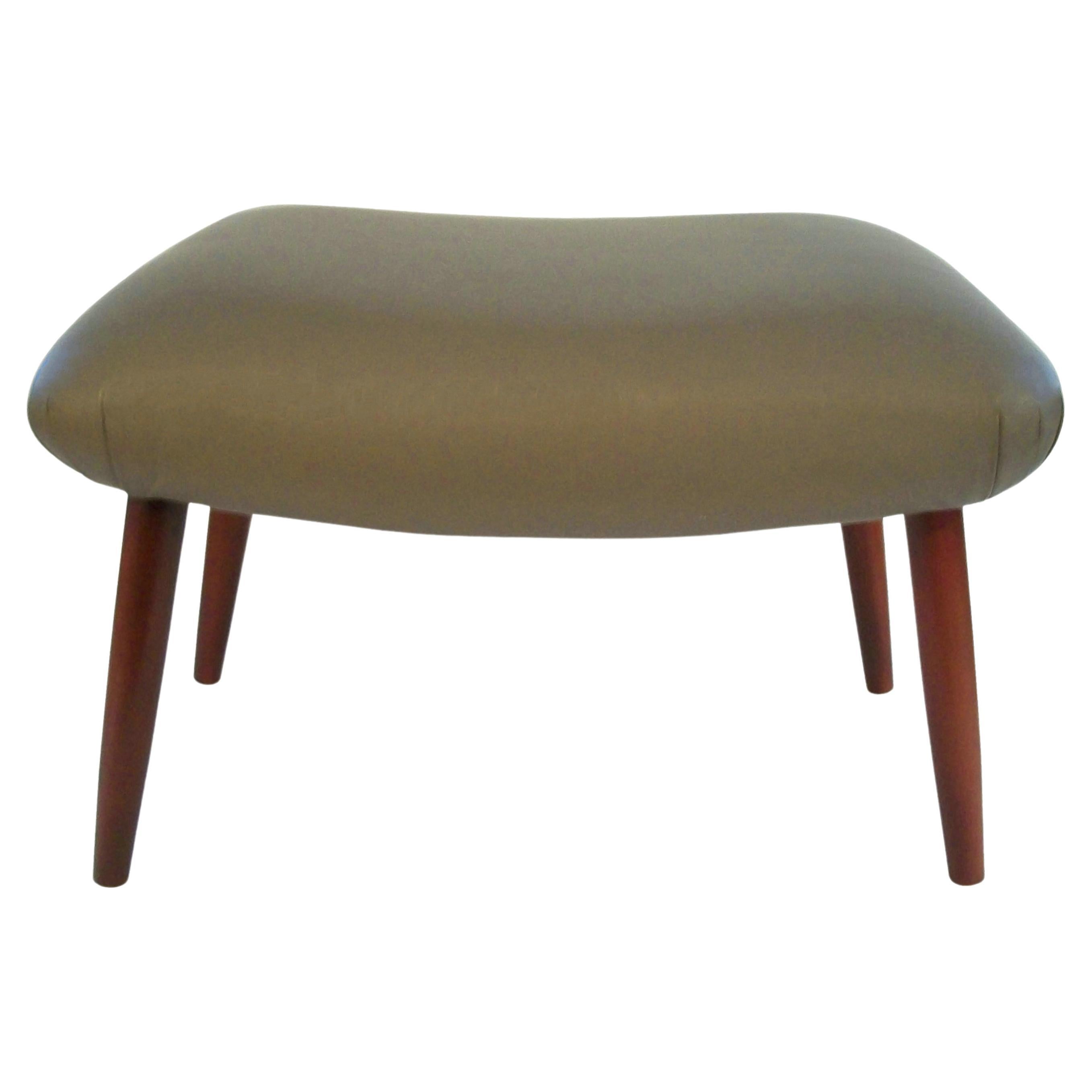 Mid Century Saddle Seat Foot Stool / Ottoman - Leather Upholstery - Circa 1980's For Sale