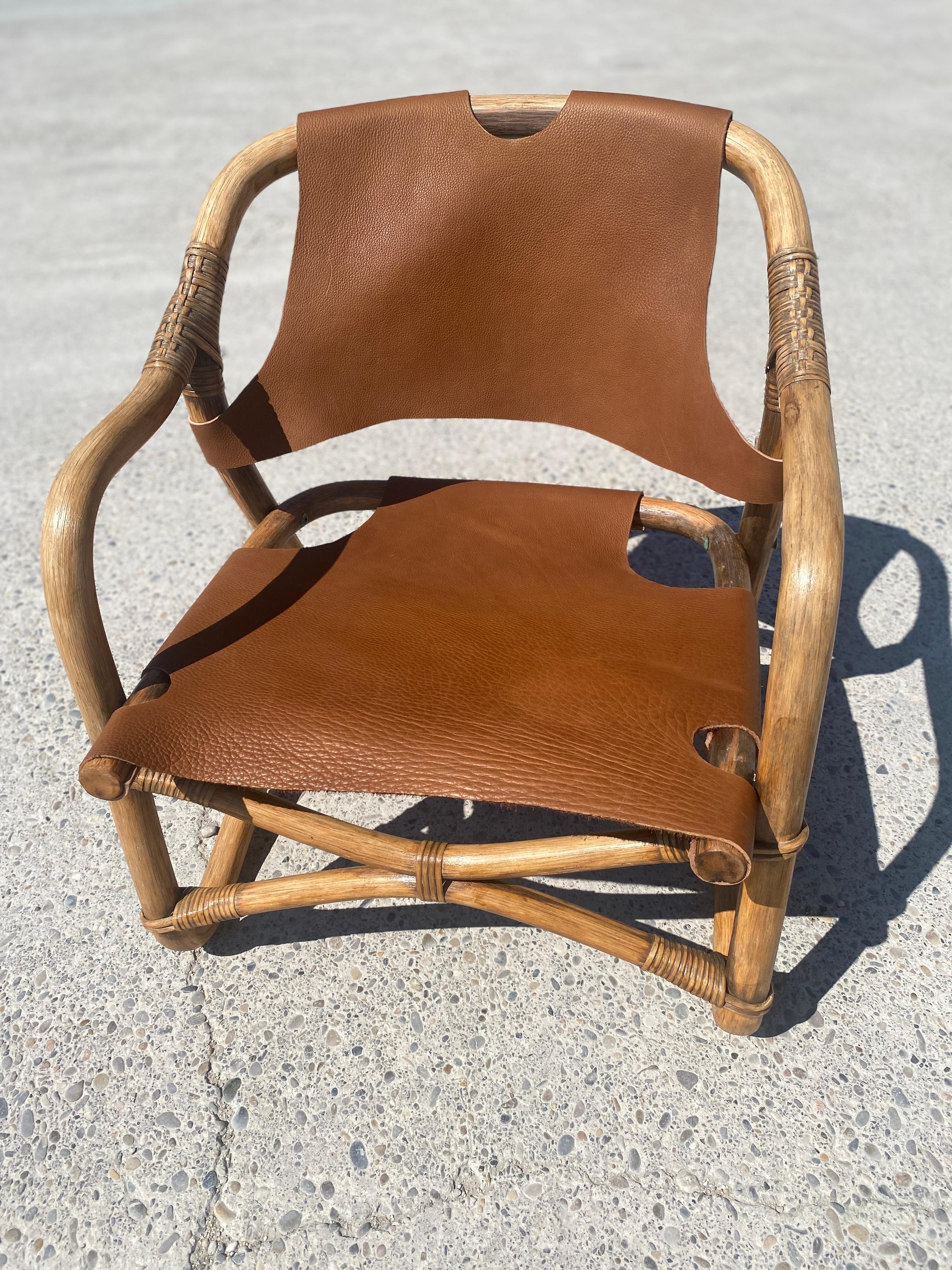 Danish bamboo safari armchair with leather seat and back. Denmark 1960. Seat and back in new cognac grained leather. Very nice workmanship. Links and structure in very good condition. Very nice workmanship.