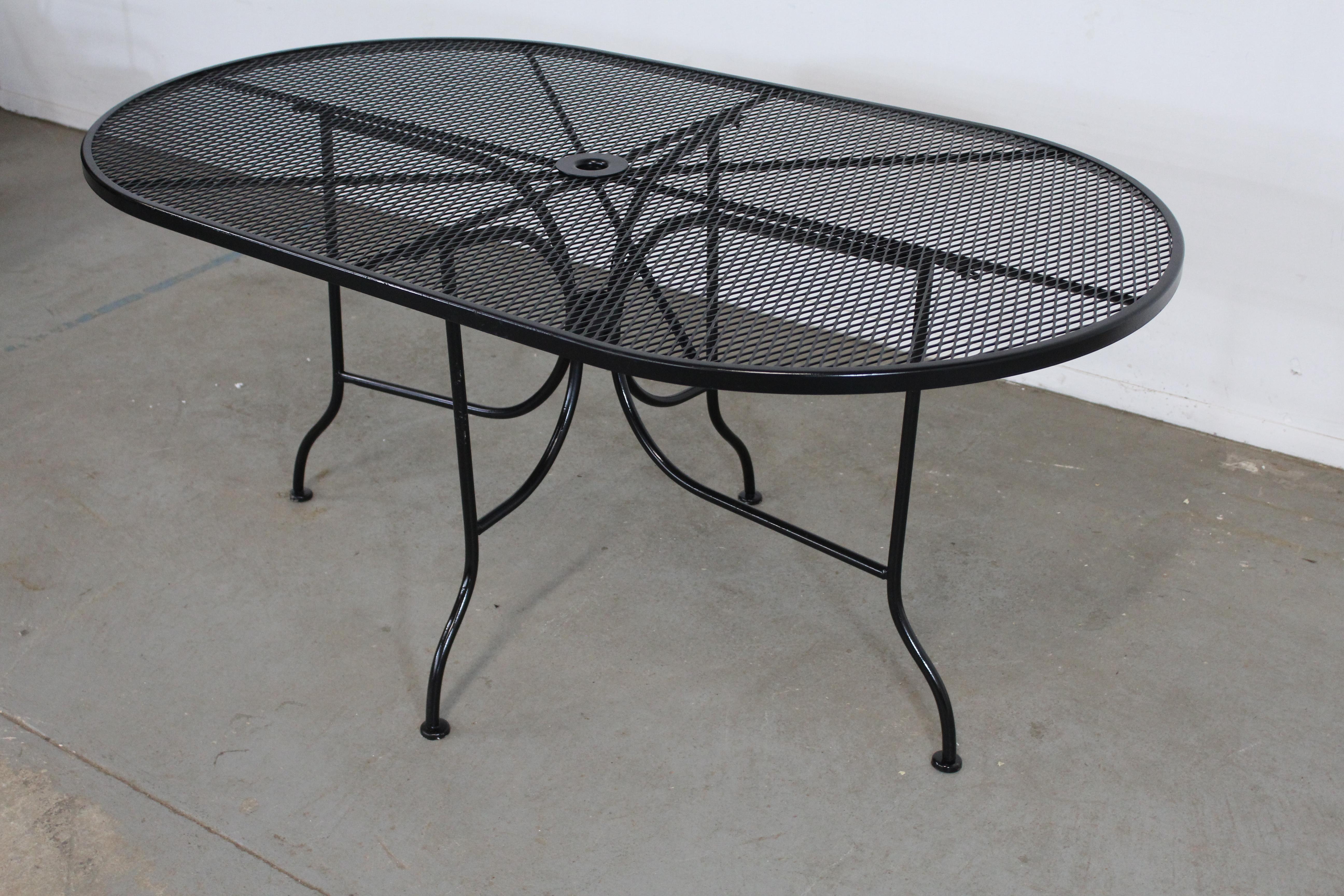 oval wrought iron patio table