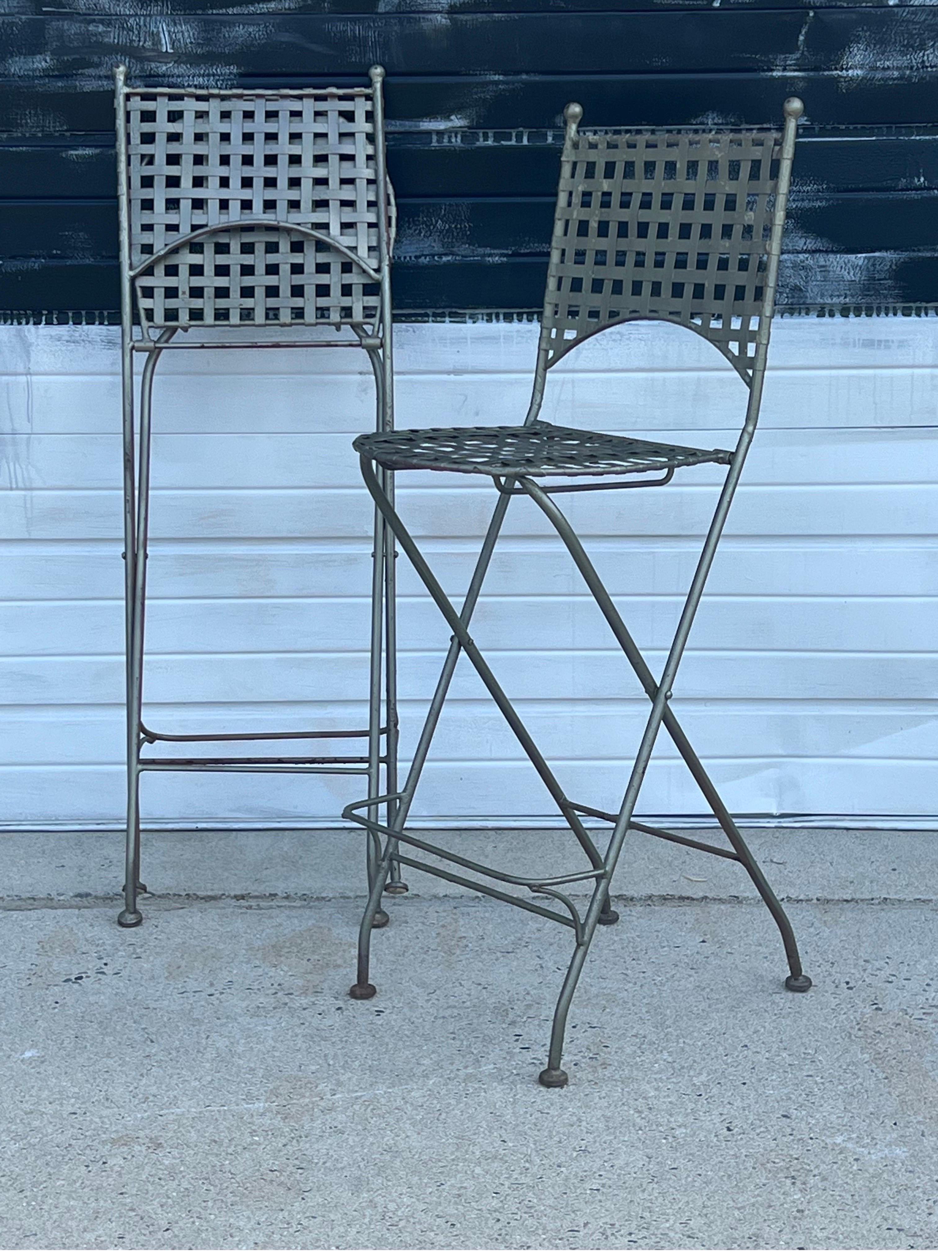Very cool foldable wrought iron Salterini barstools. Possibly French. Great condition considering age. Patina as expected but the kind you’d expect and like. They’re surprisingly comfy and sit well! Very on trend and striking from every angle.