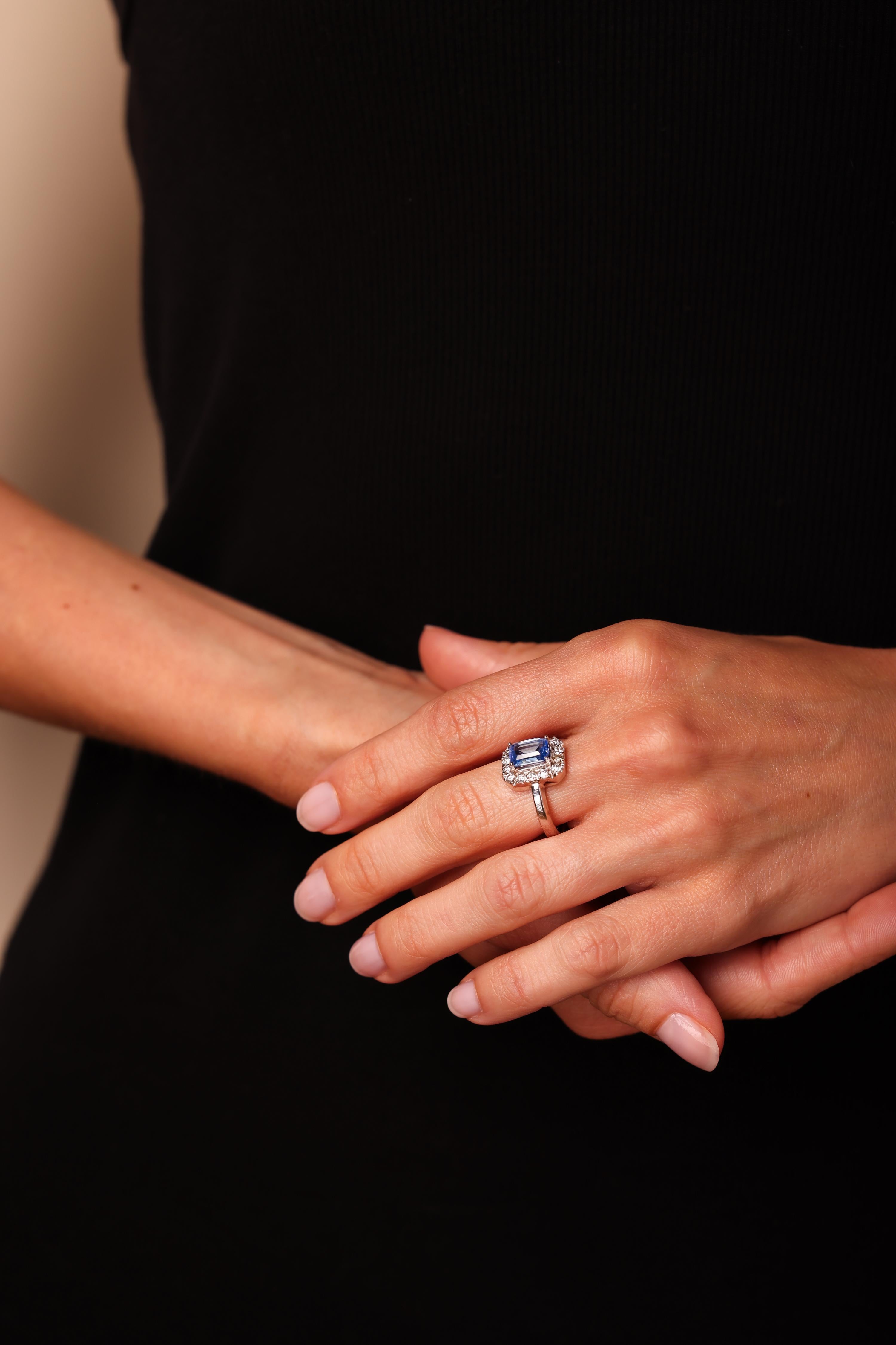 Center Stone: Sapphire
Cut: Emerald Cut
Weight: Approximately 2 Carat
Color: Blue
Accent Stone: 14 Diamonds
Cut: Round Brilliant Cut
Weight: Approximately 1 Carats
Color: I
Clarity: SI
Metal: 14K White Gold
Era: Mid Century
Circa: 1960s
Hallmarks: