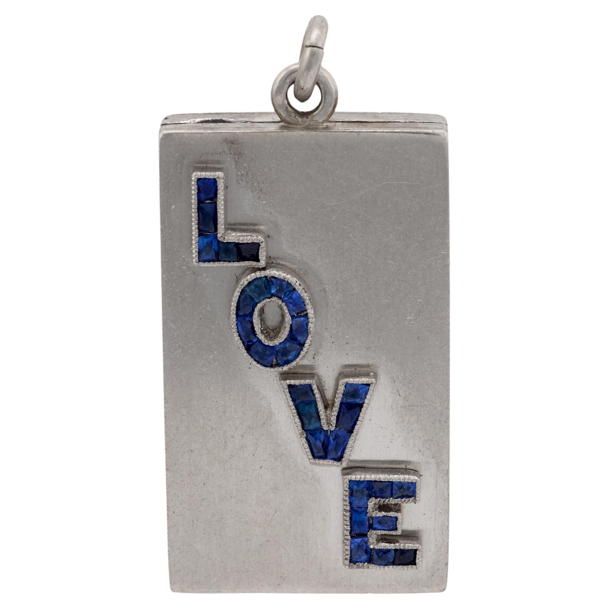 Mid Century sapphire platinum "Love" locket For Sale