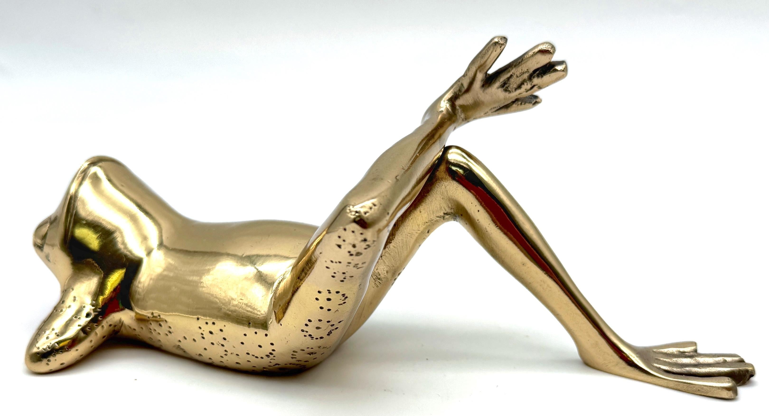 Mid-Century Sarreid Brass Reclining Frog Sculpture, Spain, circa 1960

Sarreid Ltd., Spain, circa 1960.

A whimsical cast brass reclining frog sculpture by Sarreid Ltd., produced in Spain circa 1960. This finely modeled figure captures the relaxed