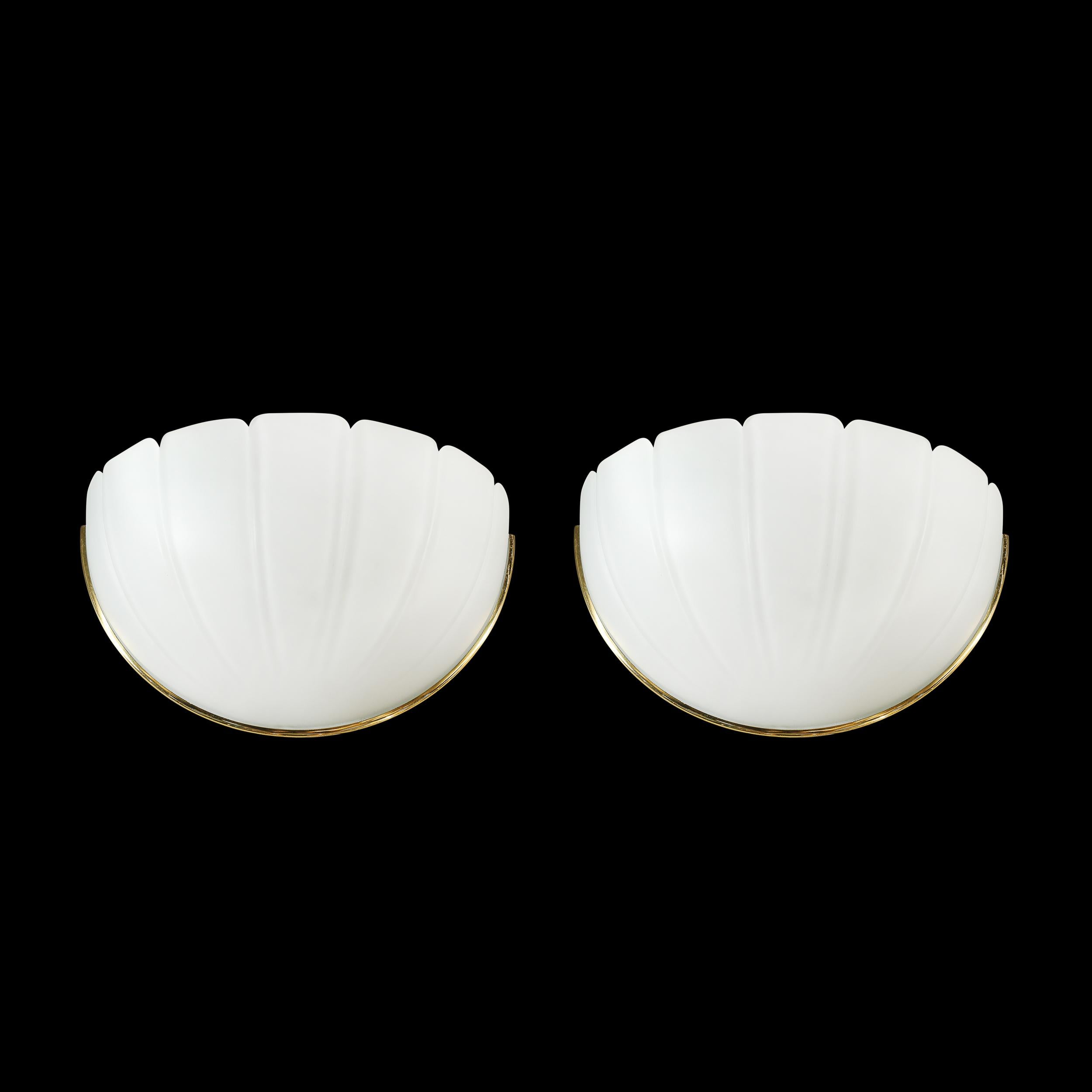 This exceptional pair of Mid-Century Modern sconces by Glashütte Limburg represents the perfect union of simplicity, elegance, and craftsmanship for which the German lighting company is renowned. Designed circa 1960, these wall sconces feature