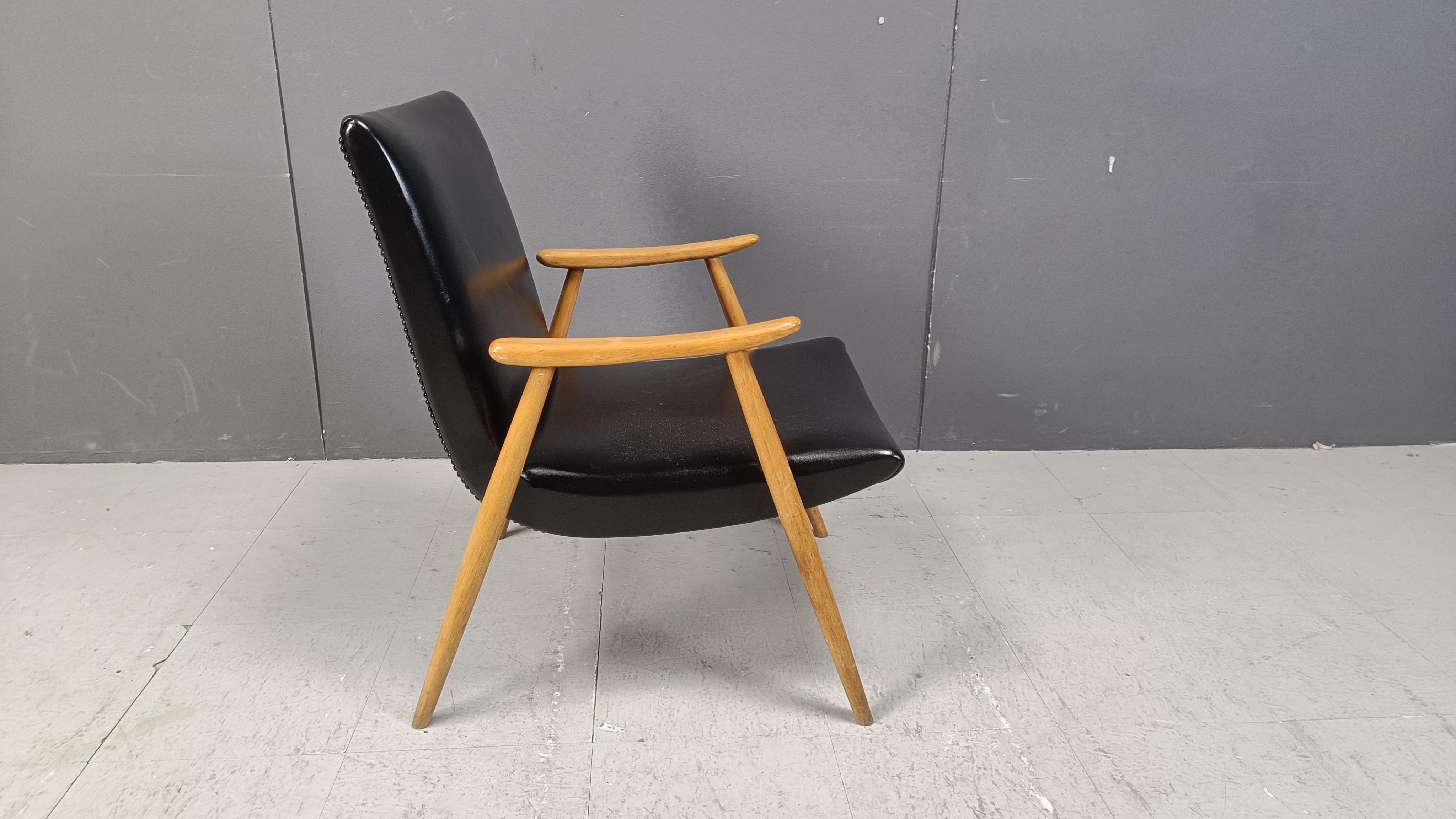 Faux Leather Mid century scandinavian armchair, 1960s For Sale