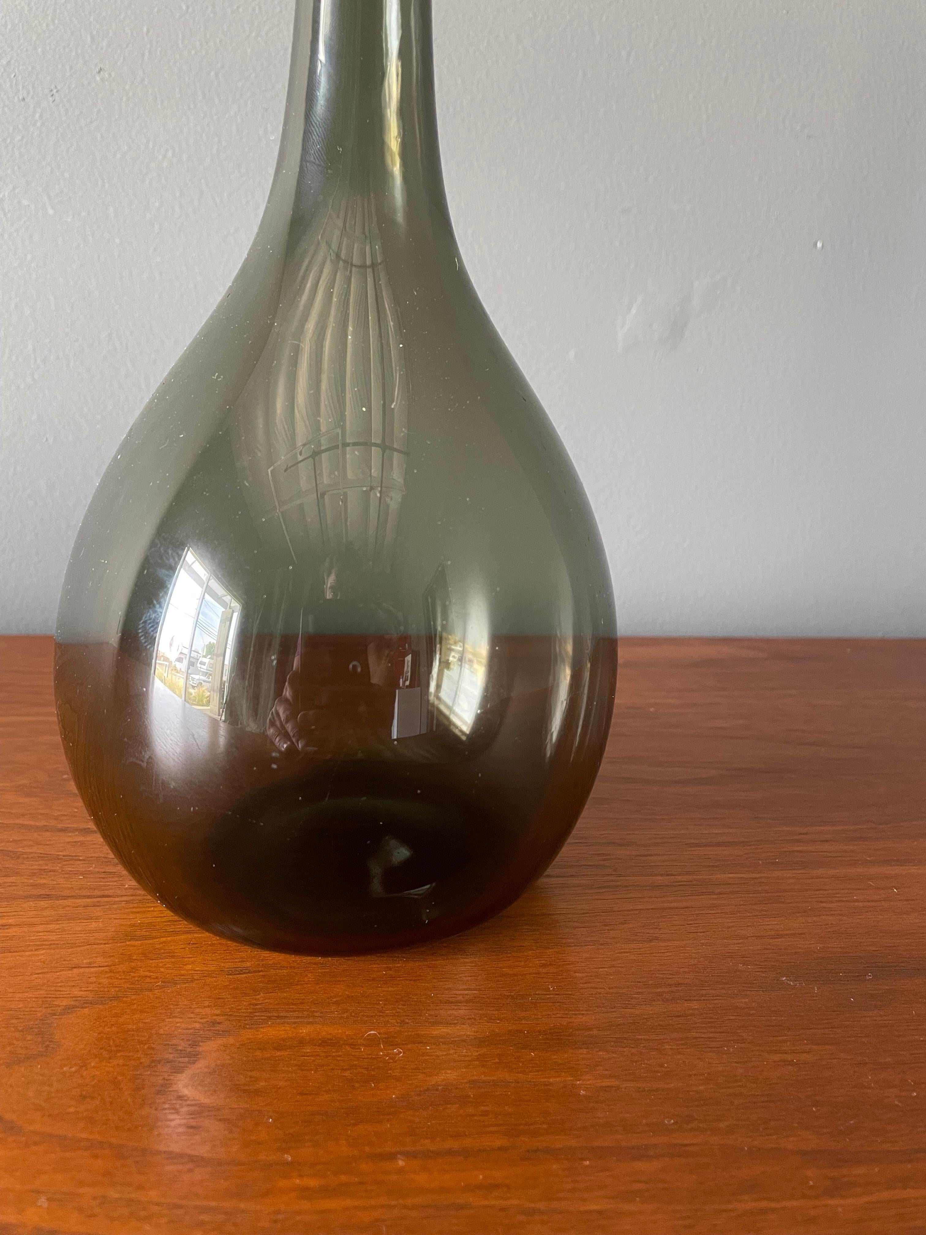 Vintage art glass vase. Circa 1960's. Slender and elegant design. A wonderful accent piece for any home.