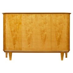 Mid century Scandinavian birch inlaid shaped sideboard