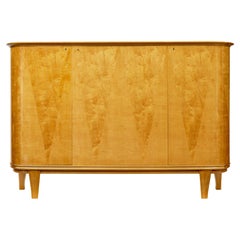 Mid century Scandinavian birch inlaid shaped sideboard